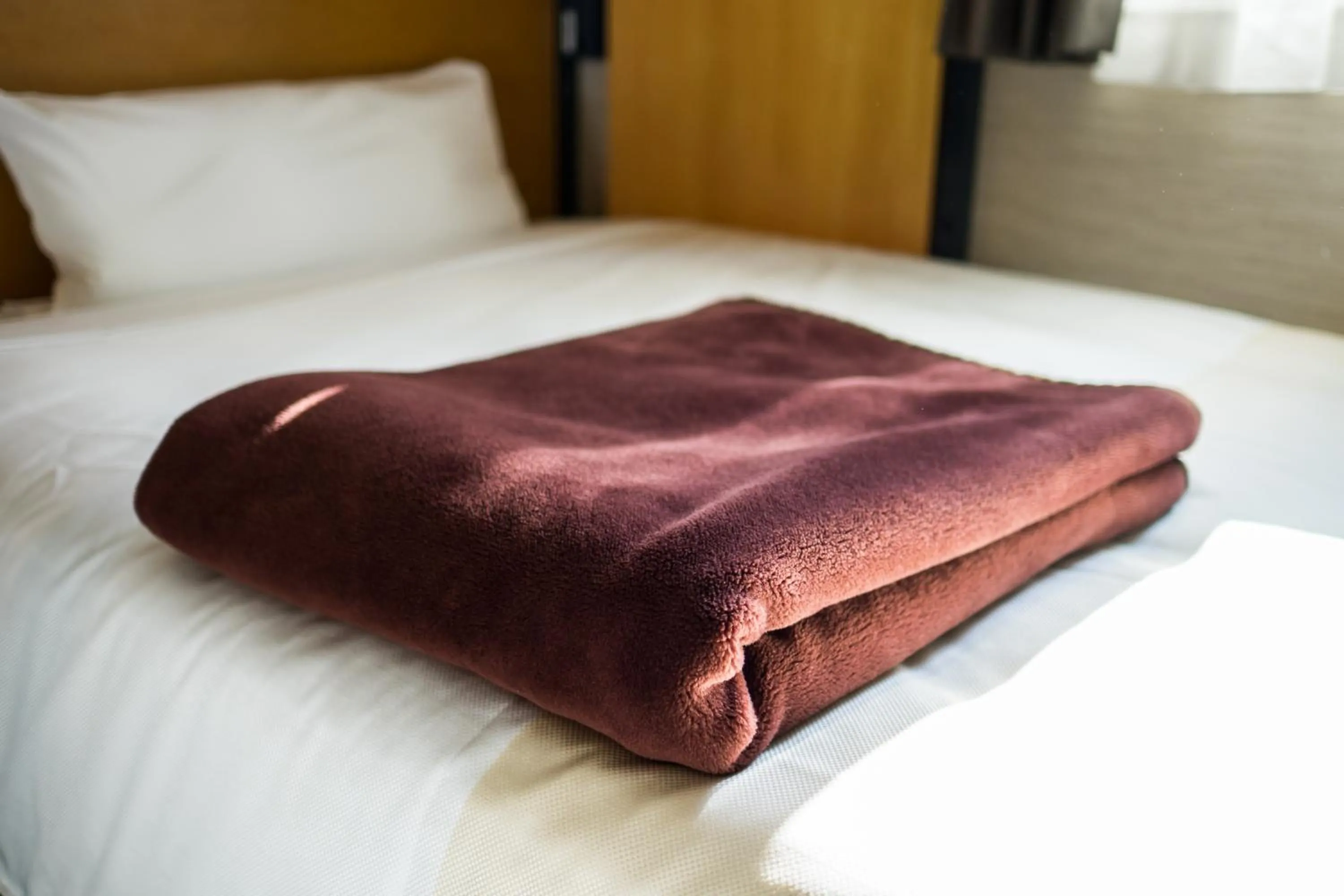 Bed in Super Hotel Minami Hikone Ekimae