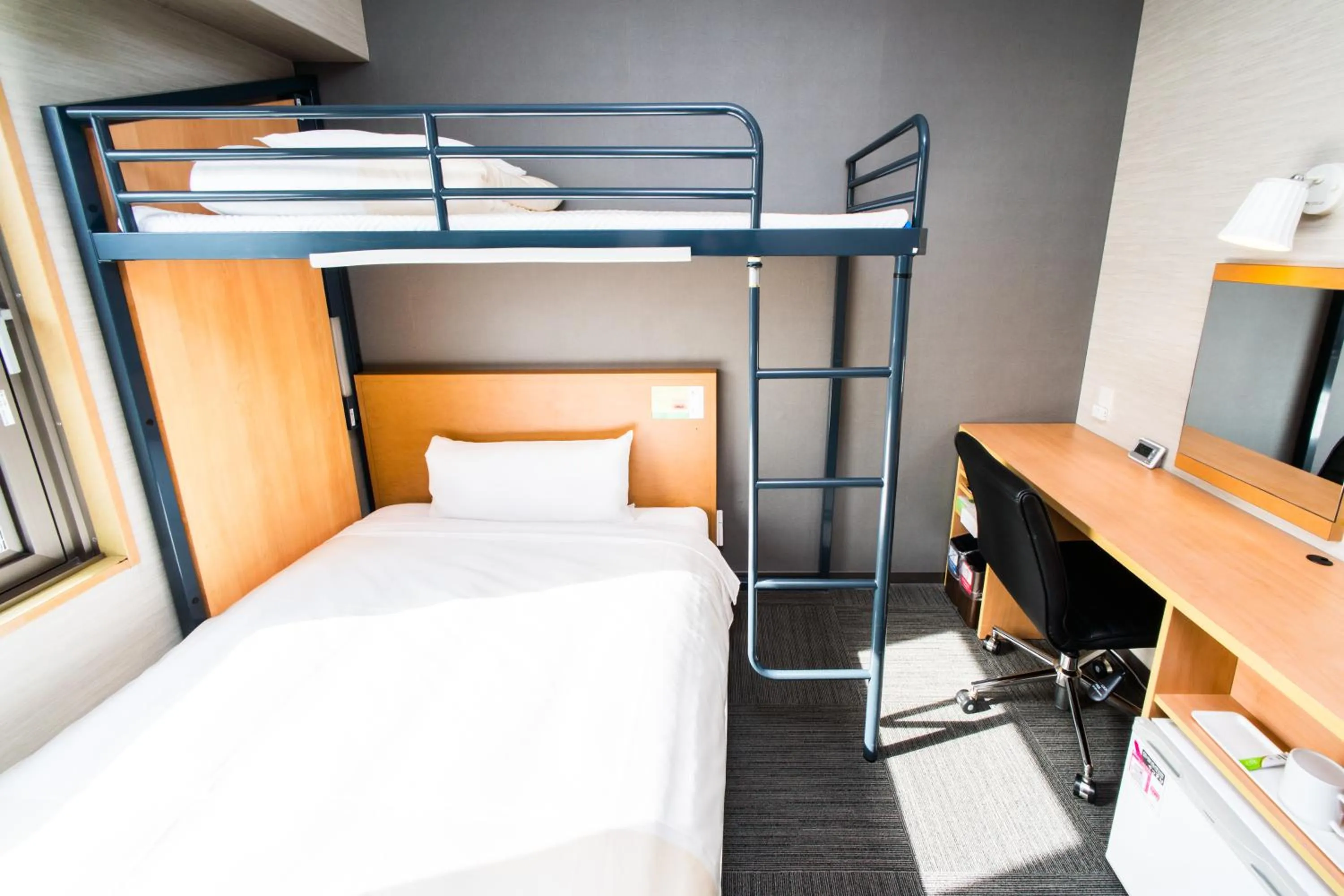 Bed in Super Hotel Minami Hikone Ekimae