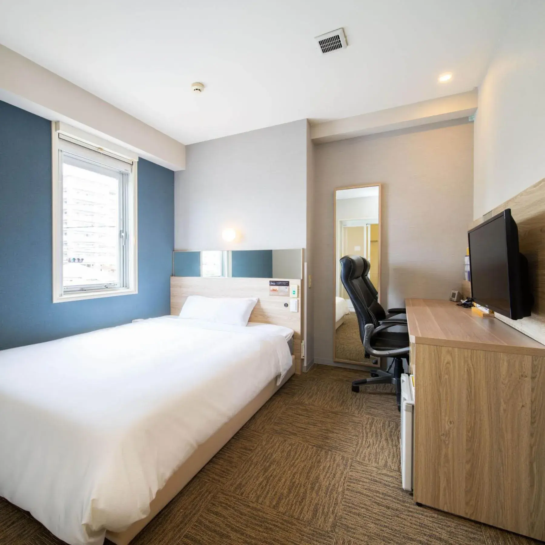 Bed in Super Hotel Okinawa Nago Bed in Super Hotel Okinawa Nago