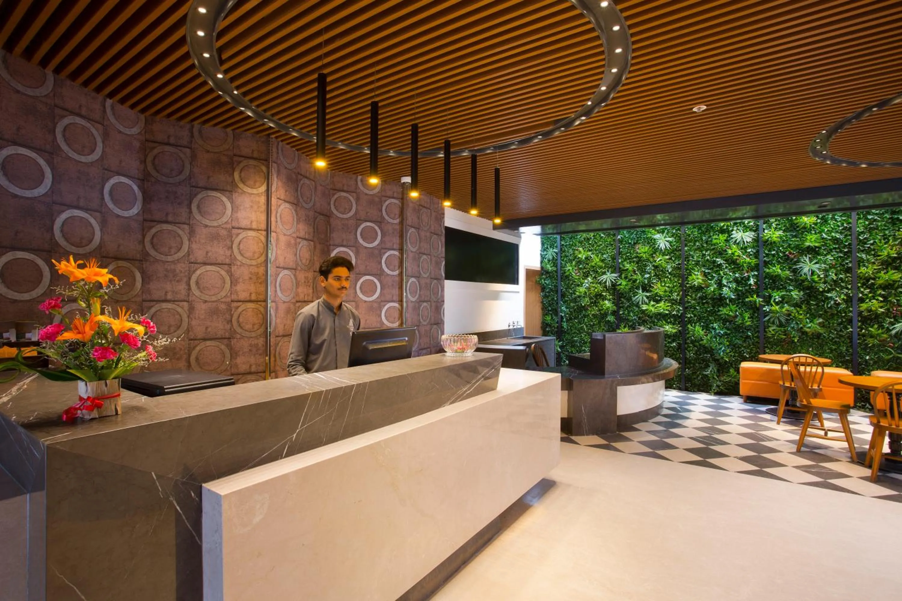 Lobby or reception in Fountain Tree by TGI