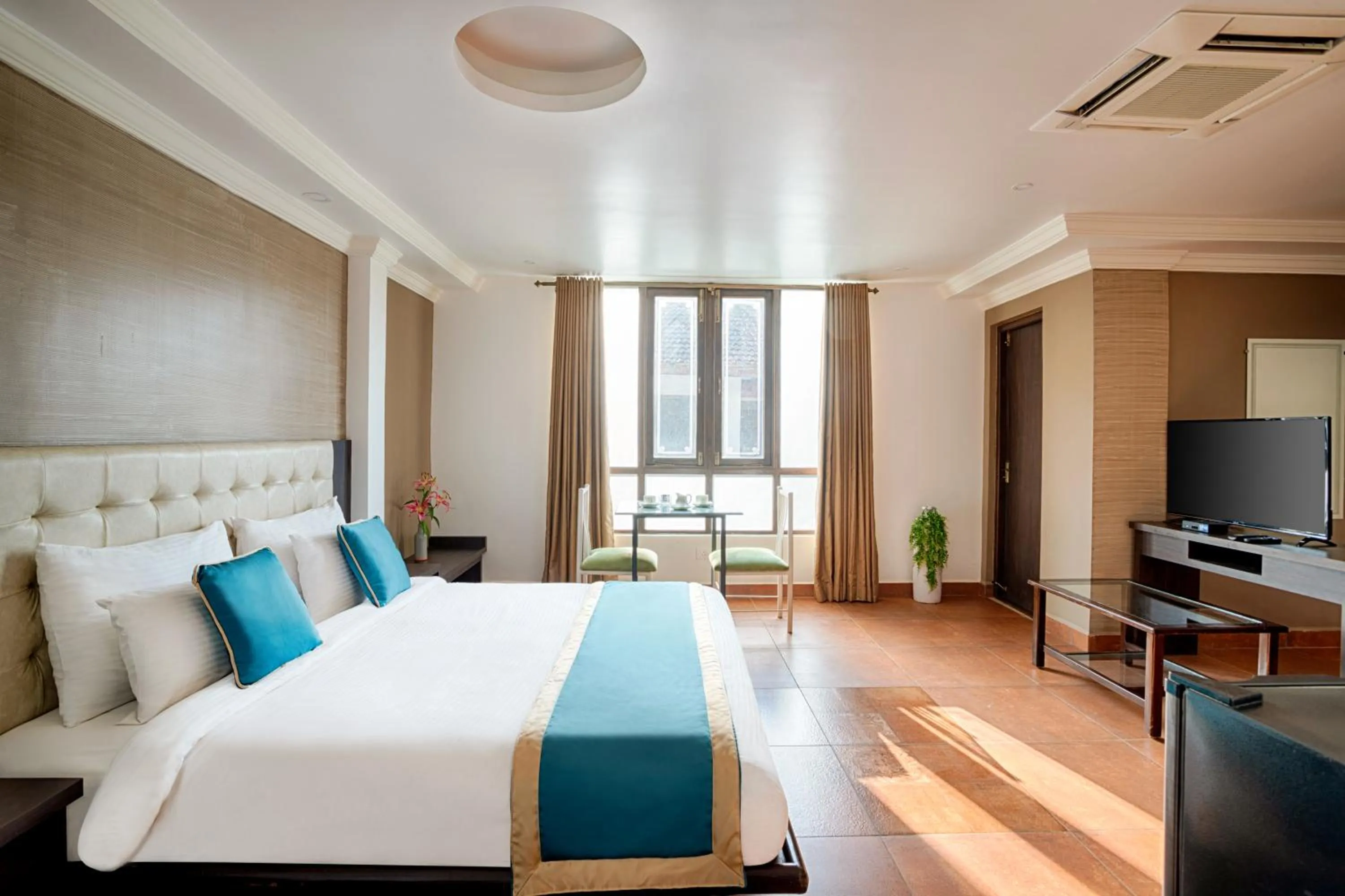 Bed in Ziva Suites - A Botique Hotel