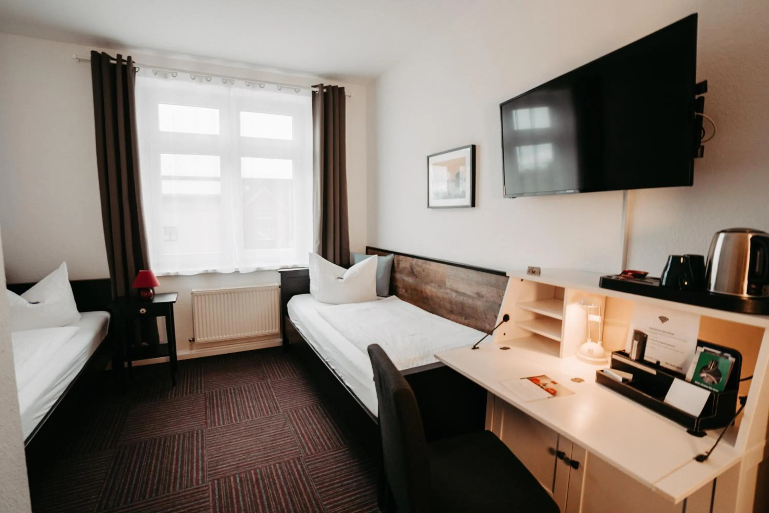 Photo of the whole room, Bed in Hotel Garni "Villa am Schaalsee"