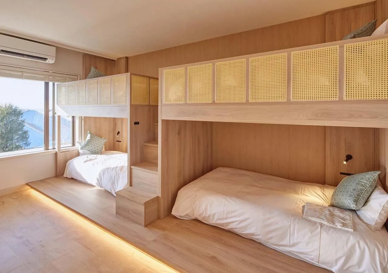 Bed in Royal View Hotel Churaumi