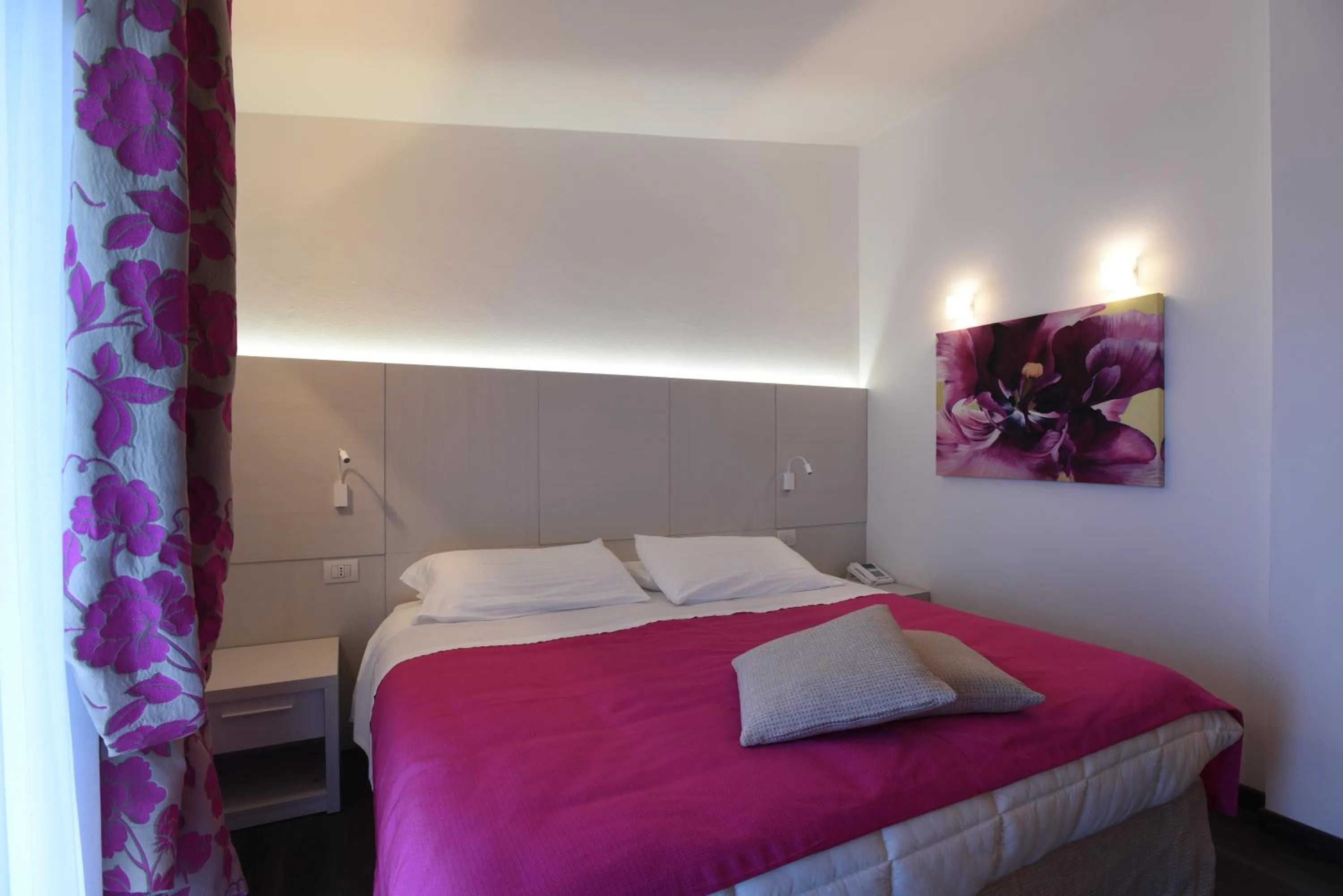 Bedroom in Hotel La Vigna