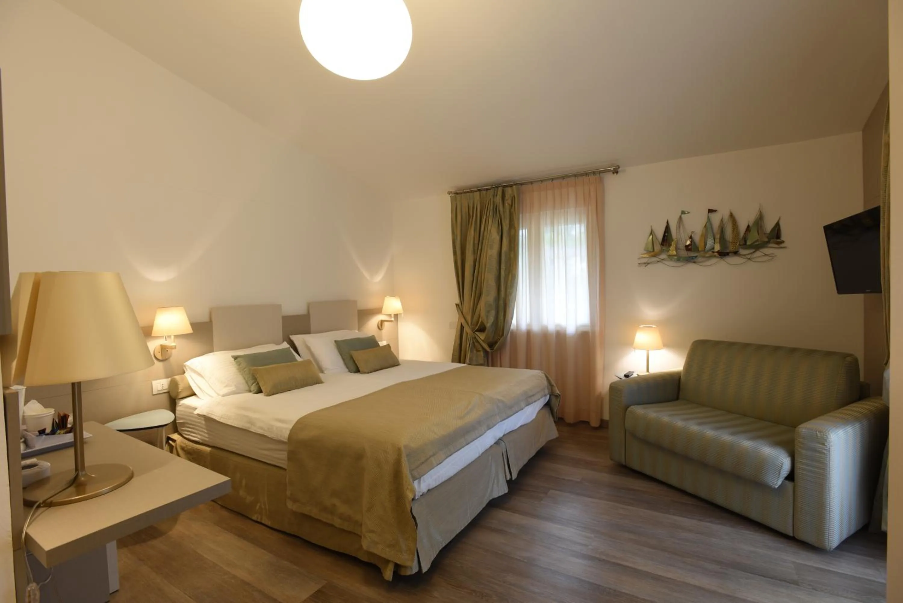 Bedroom in Hotel La Vigna