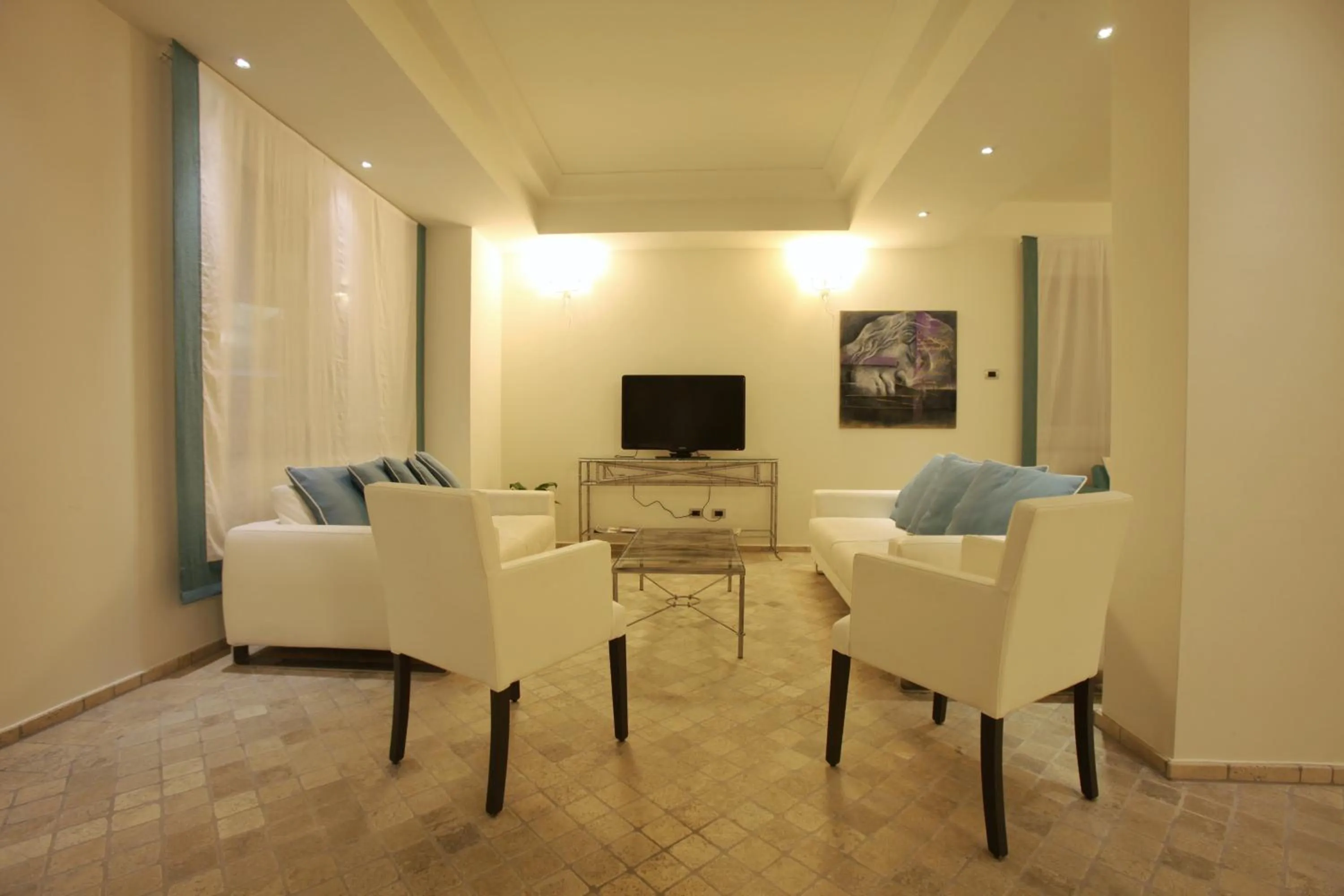 Communal lounge/ TV room in Hotel Mea - Aeolian Charme