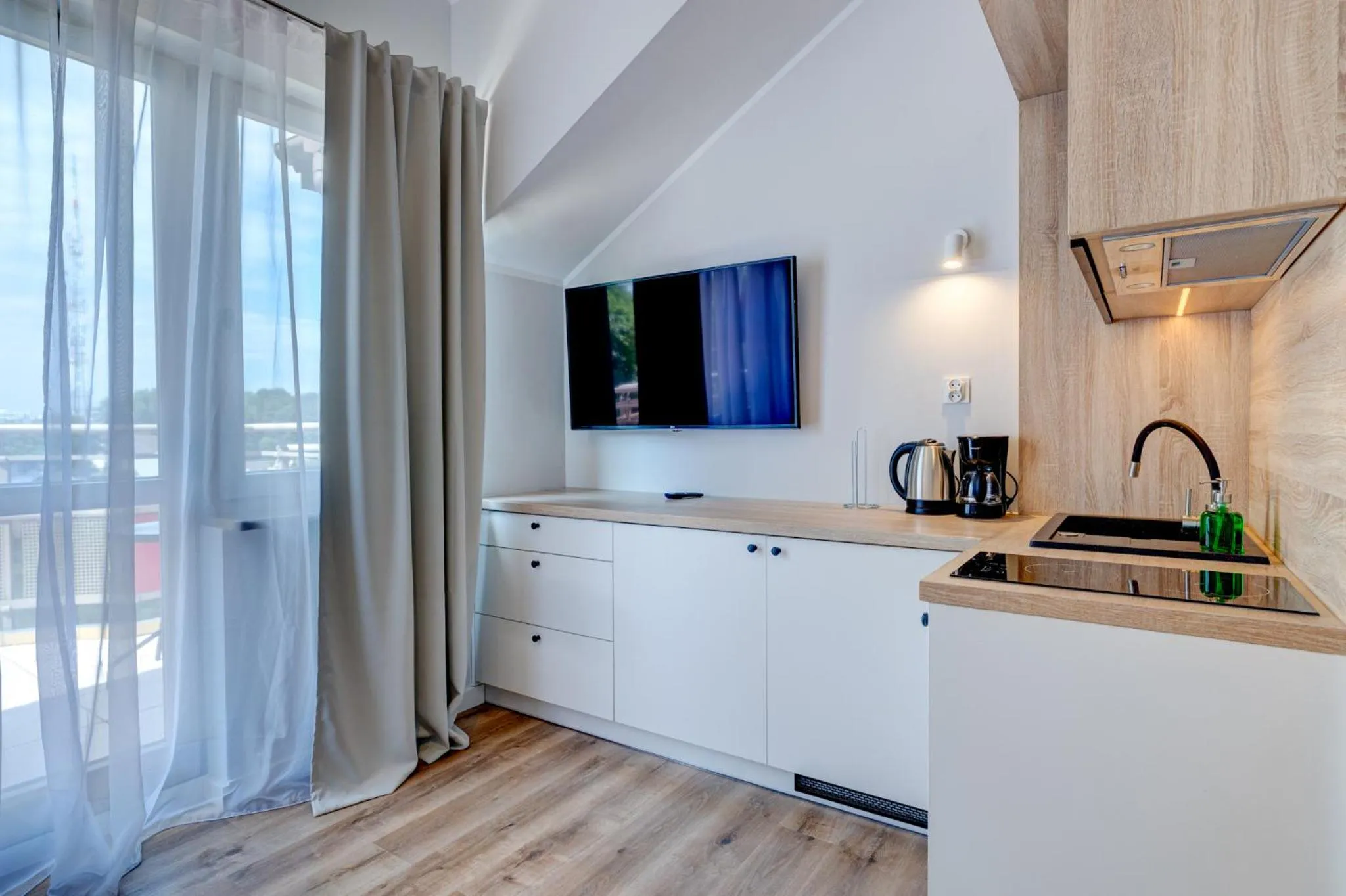 Kitchen or kitchenette in Apartamenty Zdrojowa