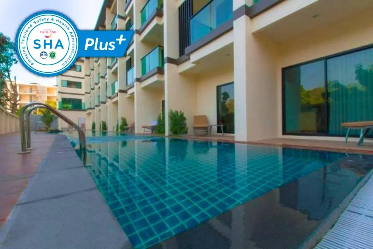 Swimming pool in Airport Beach Hotel Phuket