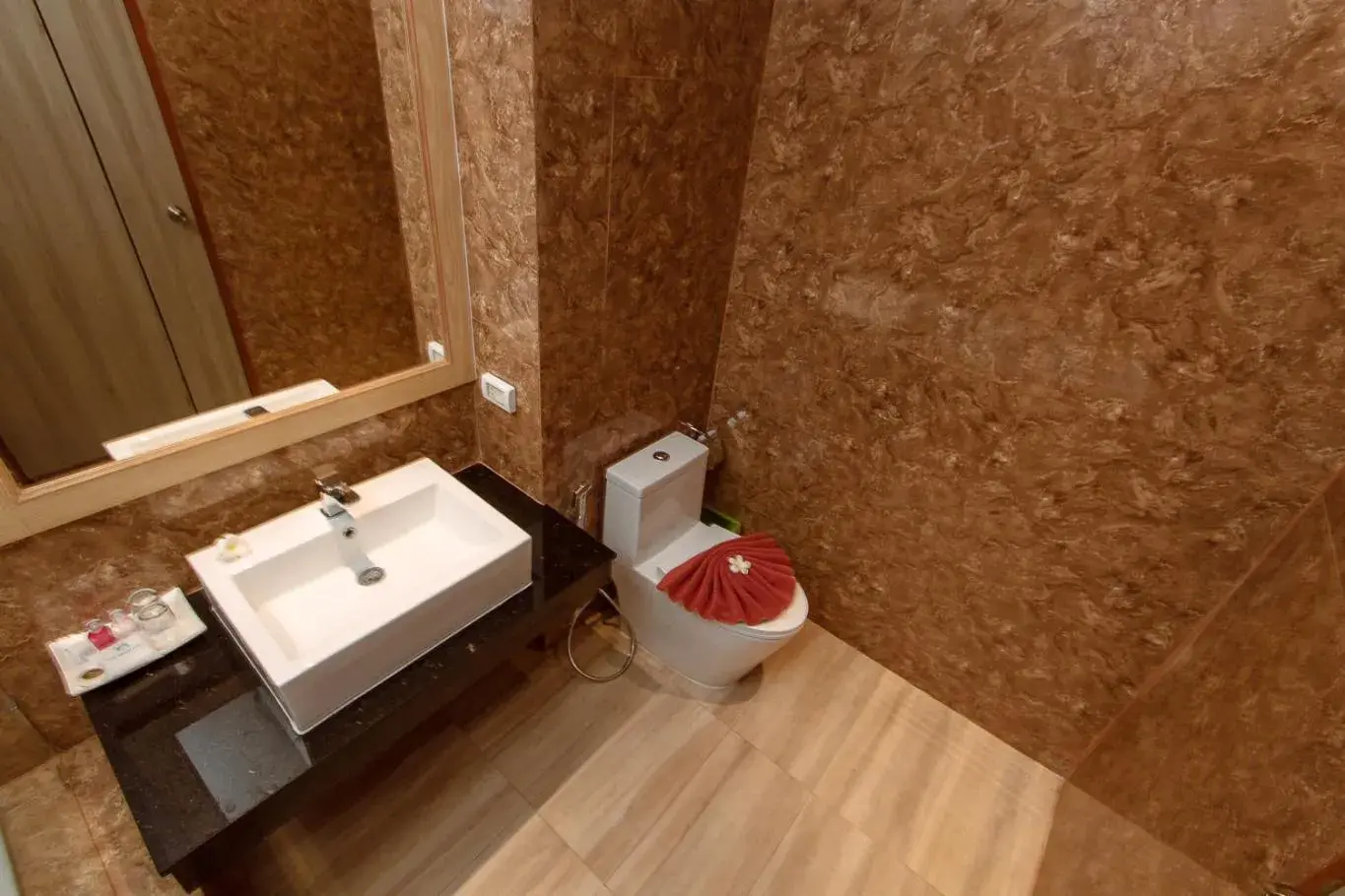 Bathroom in Airport Beach Hotel Phuket Bathroom in Airport Beach Hotel Phuket