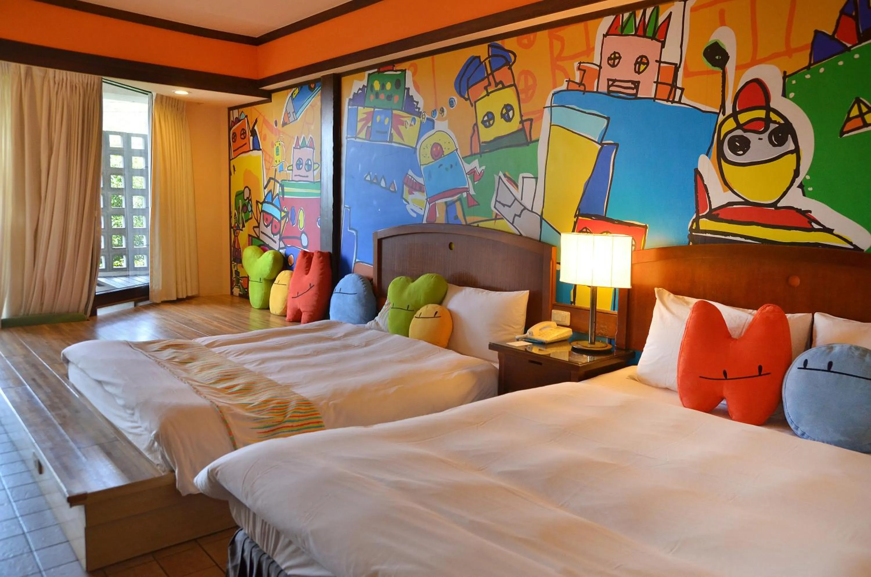 Photo of the whole room, Bed in Yoho Beach Resort Kenting