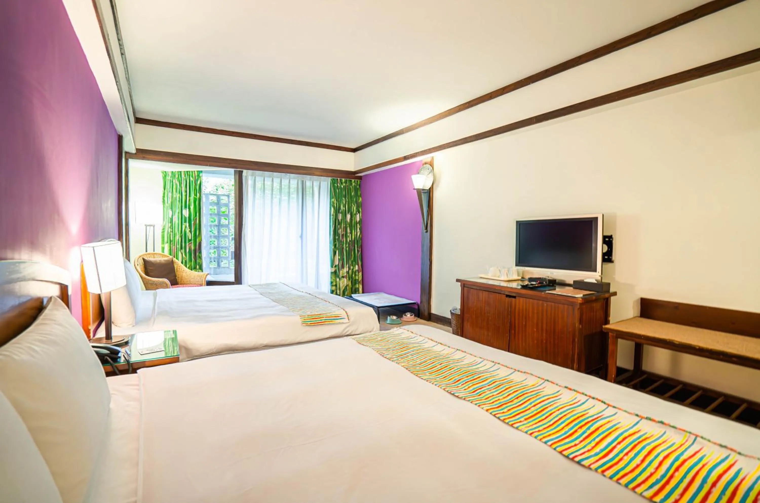 Photo of the whole room, Bed in Yoho Beach Resort Kenting