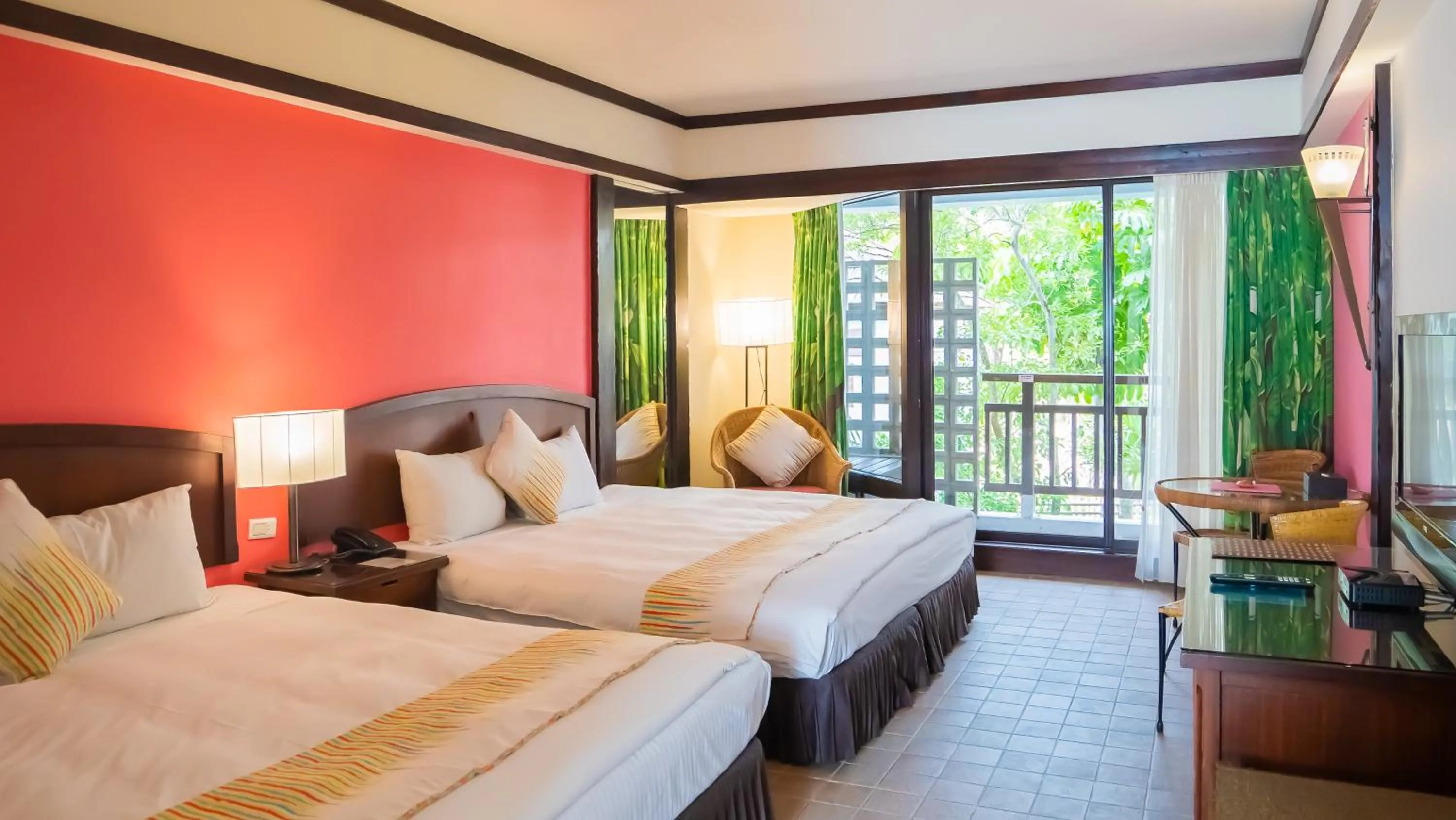 Photo of the whole room, Bed in Yoho Beach Resort Kenting