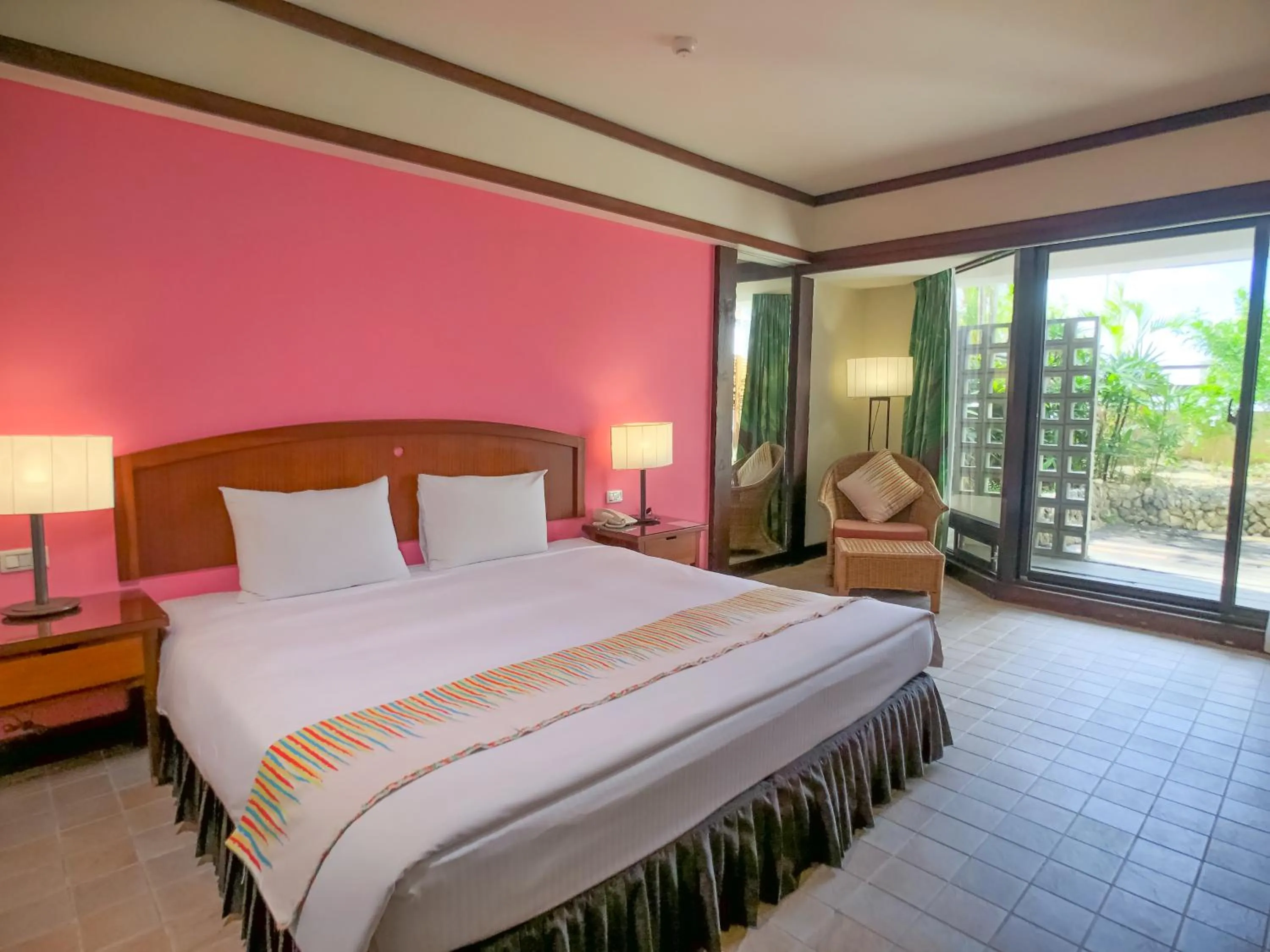 Photo of the whole room, Bed in Yoho Beach Resort Kenting