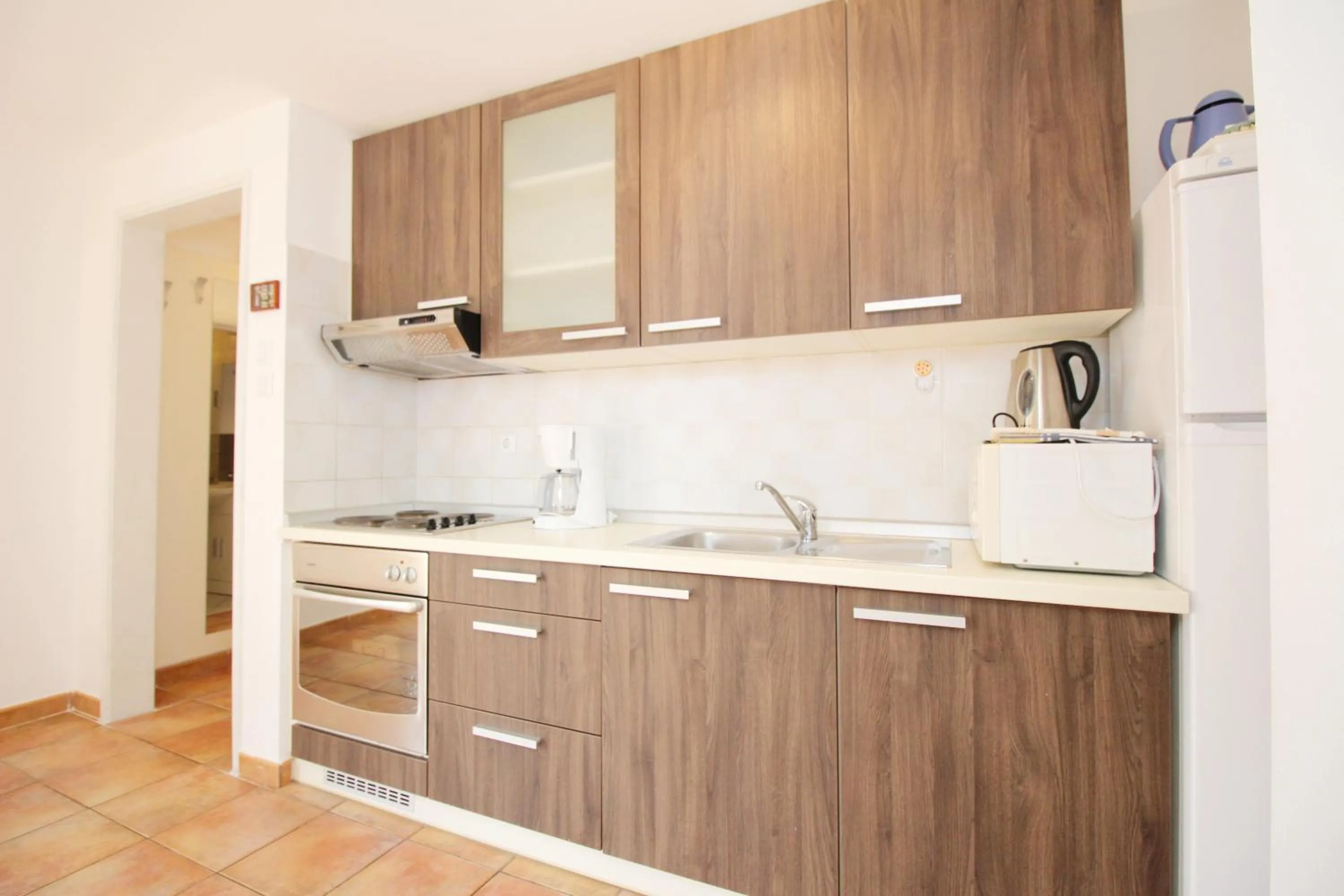 Kitchen or kitchenette in Apartment Pintar Beach