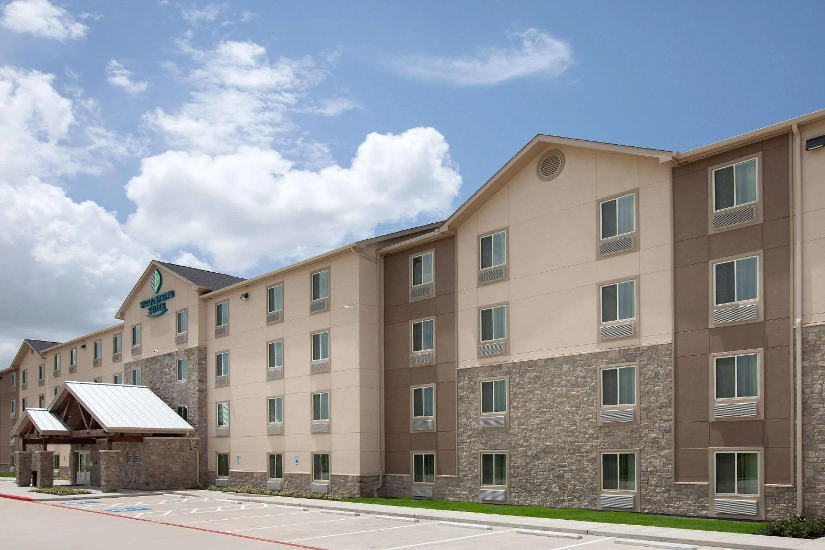 Property building in WoodSpring Suites Houston 288 South Medical Center