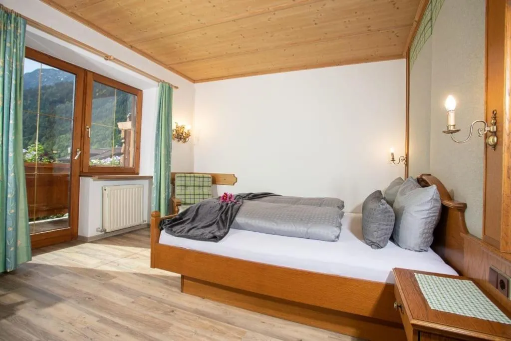 Bed in ALPENHOTEL TYROL - B&B - ADULTS ONLY - Alpines Lifestylehotel