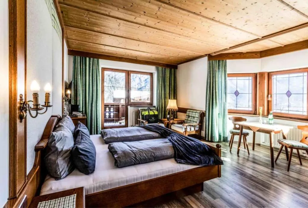 Bed in ALPENHOTEL TYROL - B&B - ADULTS ONLY - Alpines Lifestylehotel