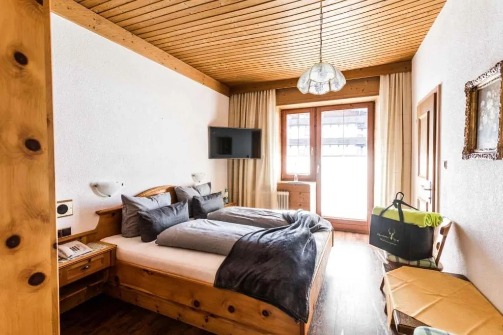 Bed in ALPENHOTEL TYROL - B&B - ADULTS ONLY - Alpines Lifestylehotel