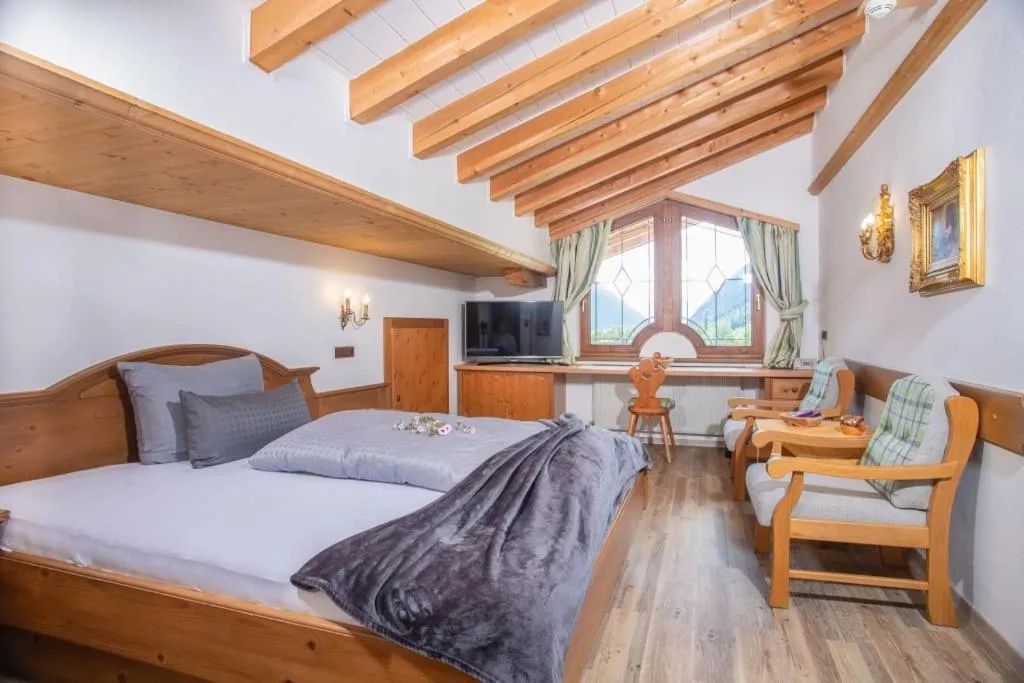 Bed in ALPENHOTEL TYROL - B&B - ADULTS ONLY - Alpines Lifestylehotel