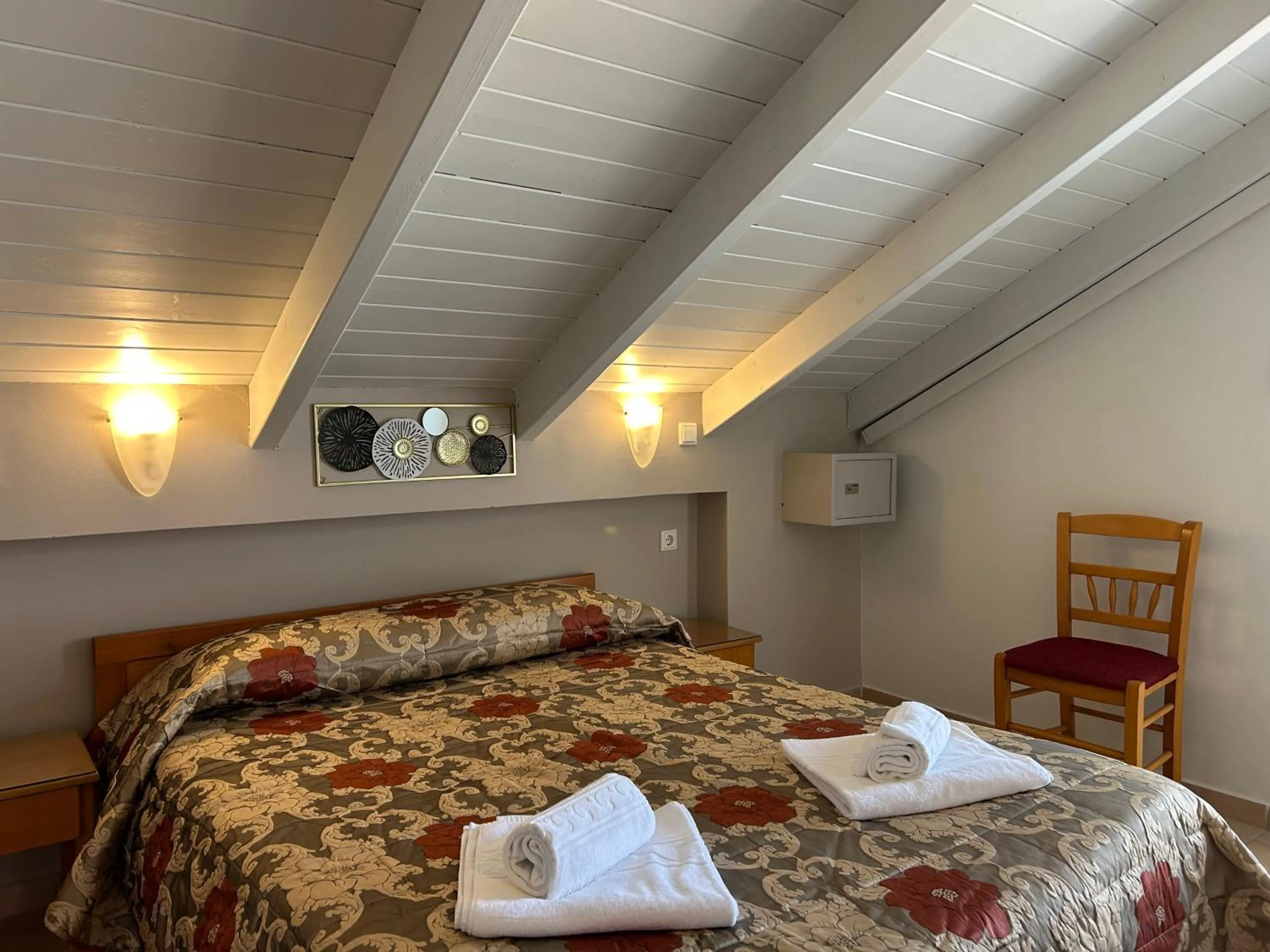 Bed in Brati II Beach Hotel
