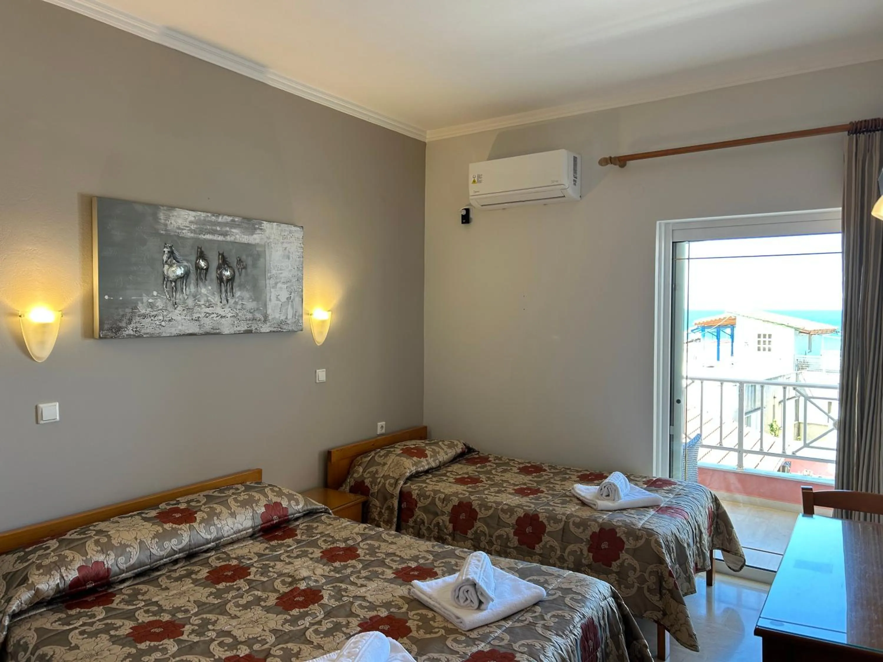 Bed in Brati II Beach Hotel