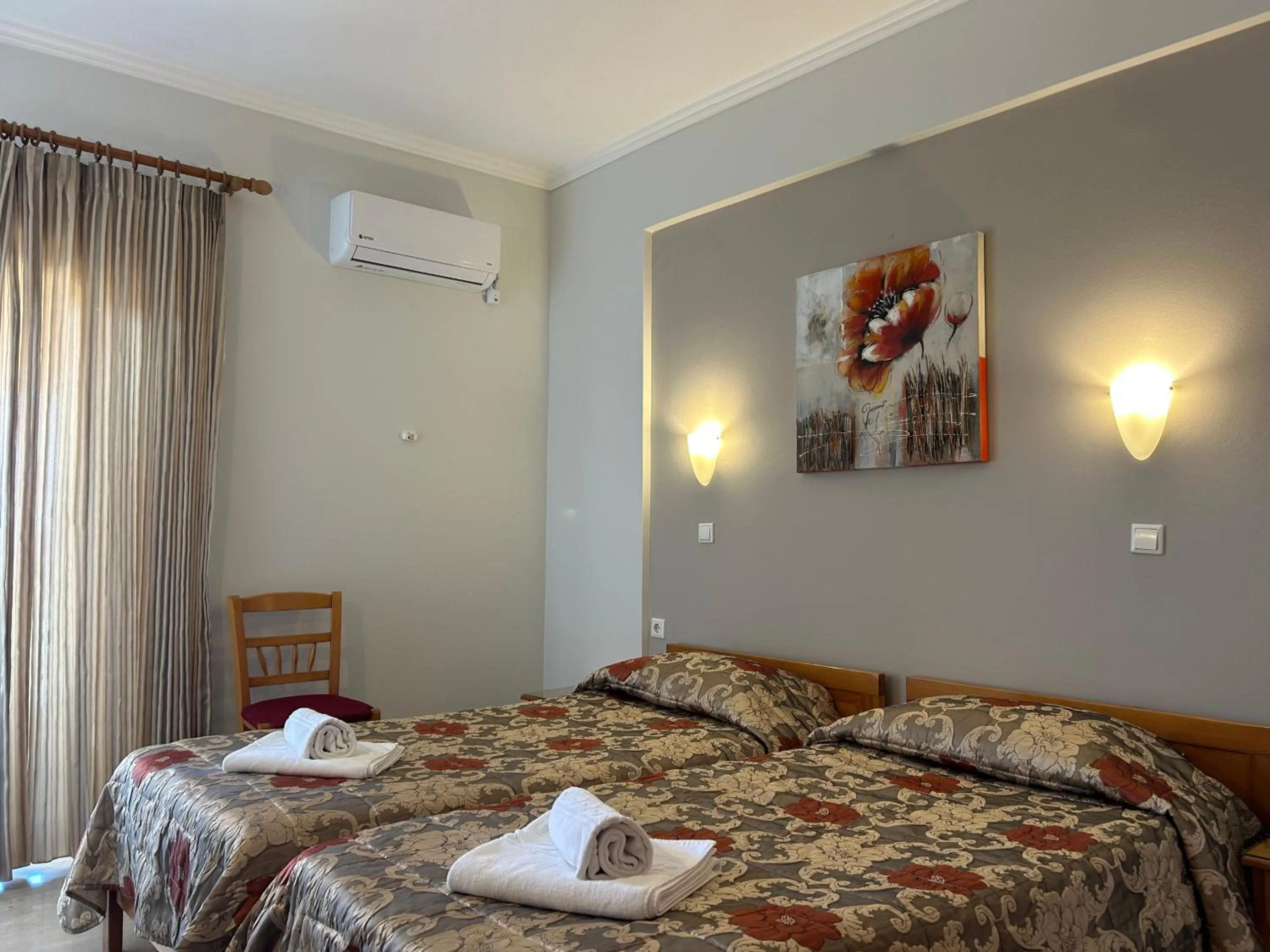 Bed in Brati II Beach Hotel