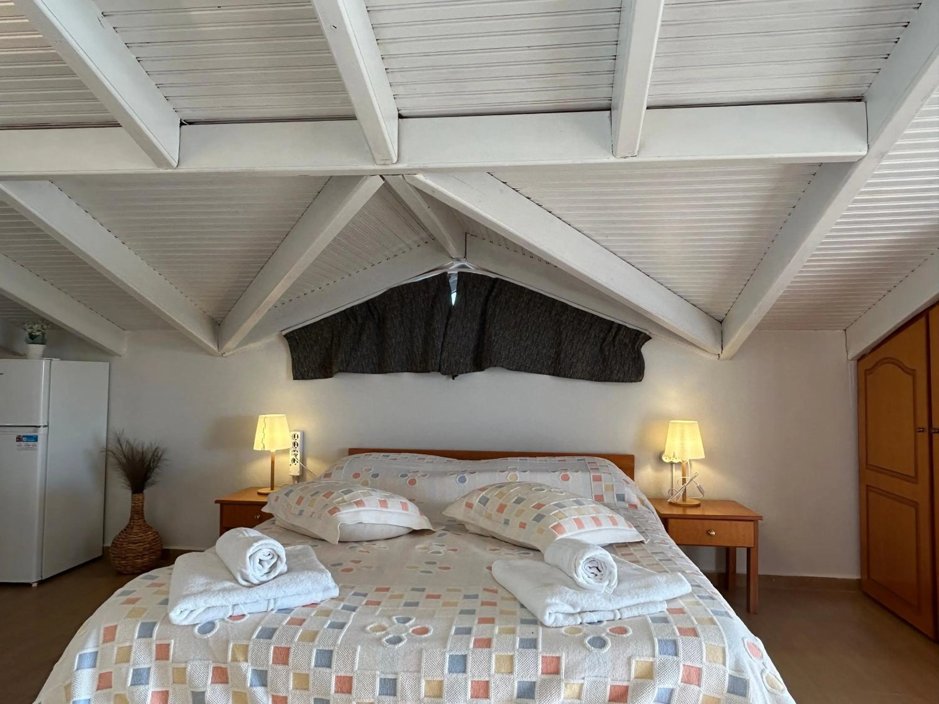 Bed in Brati II Beach Hotel
