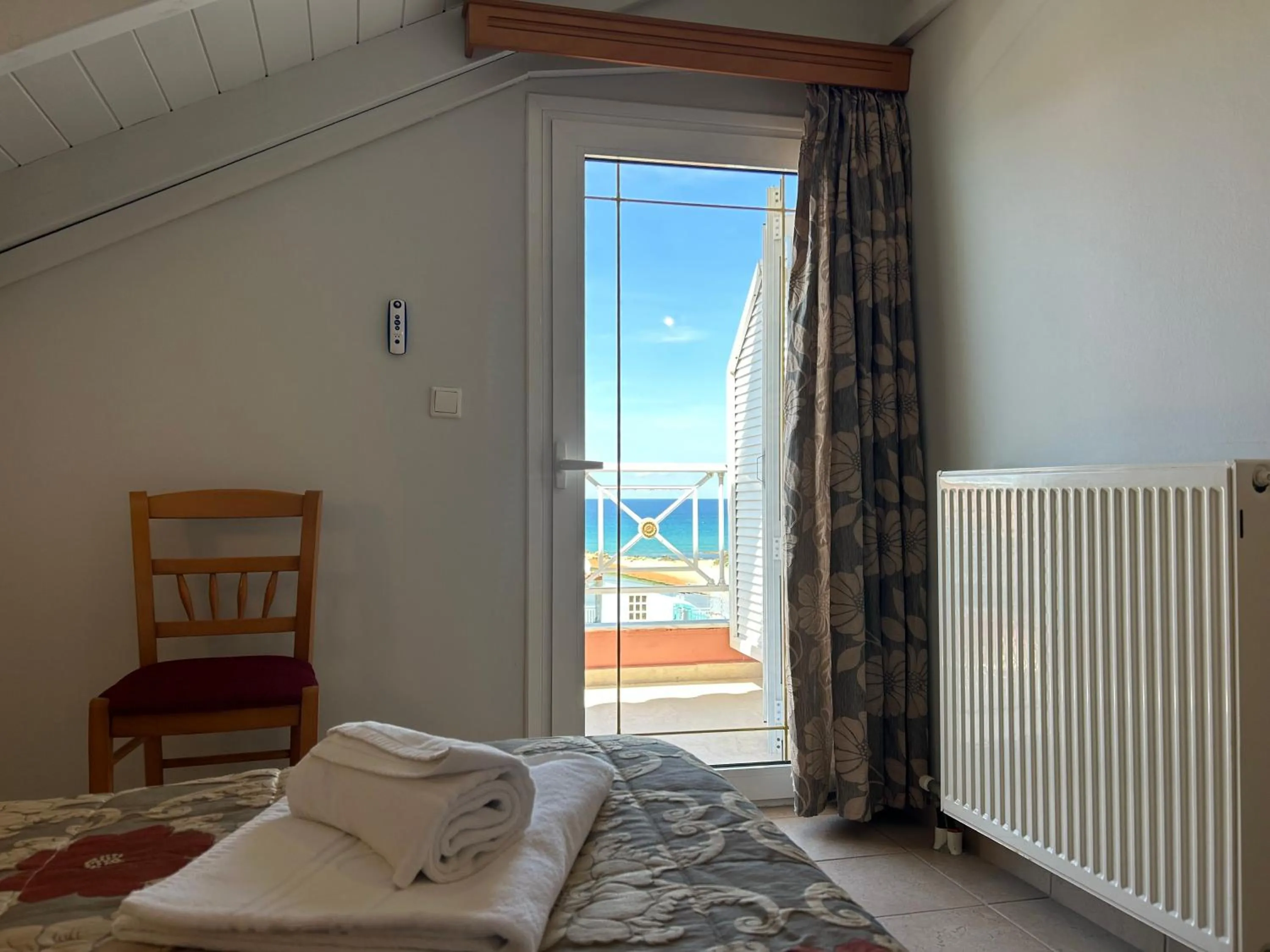 Bed in Brati II Beach Hotel