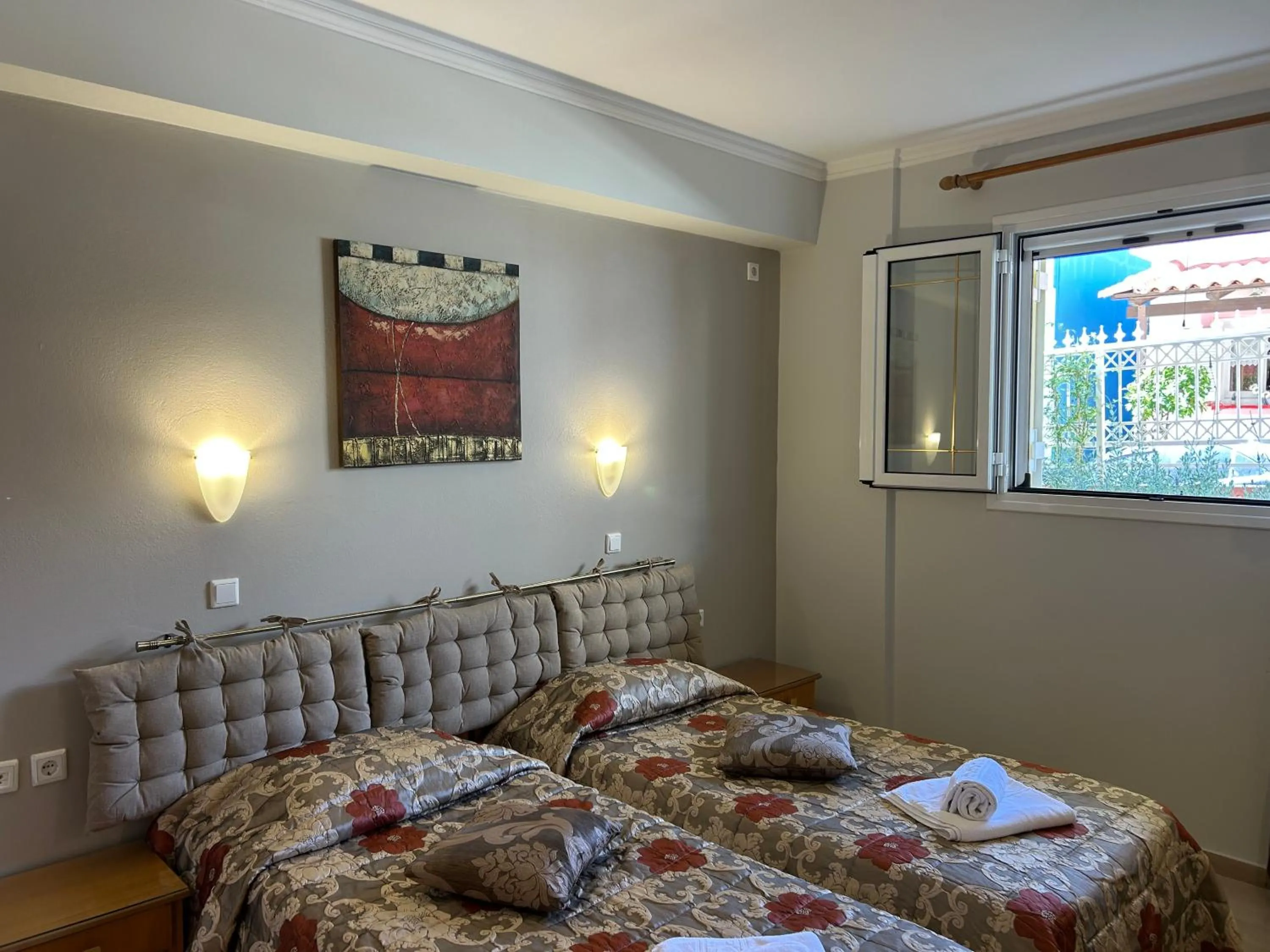 Bed in Brati II Beach Hotel