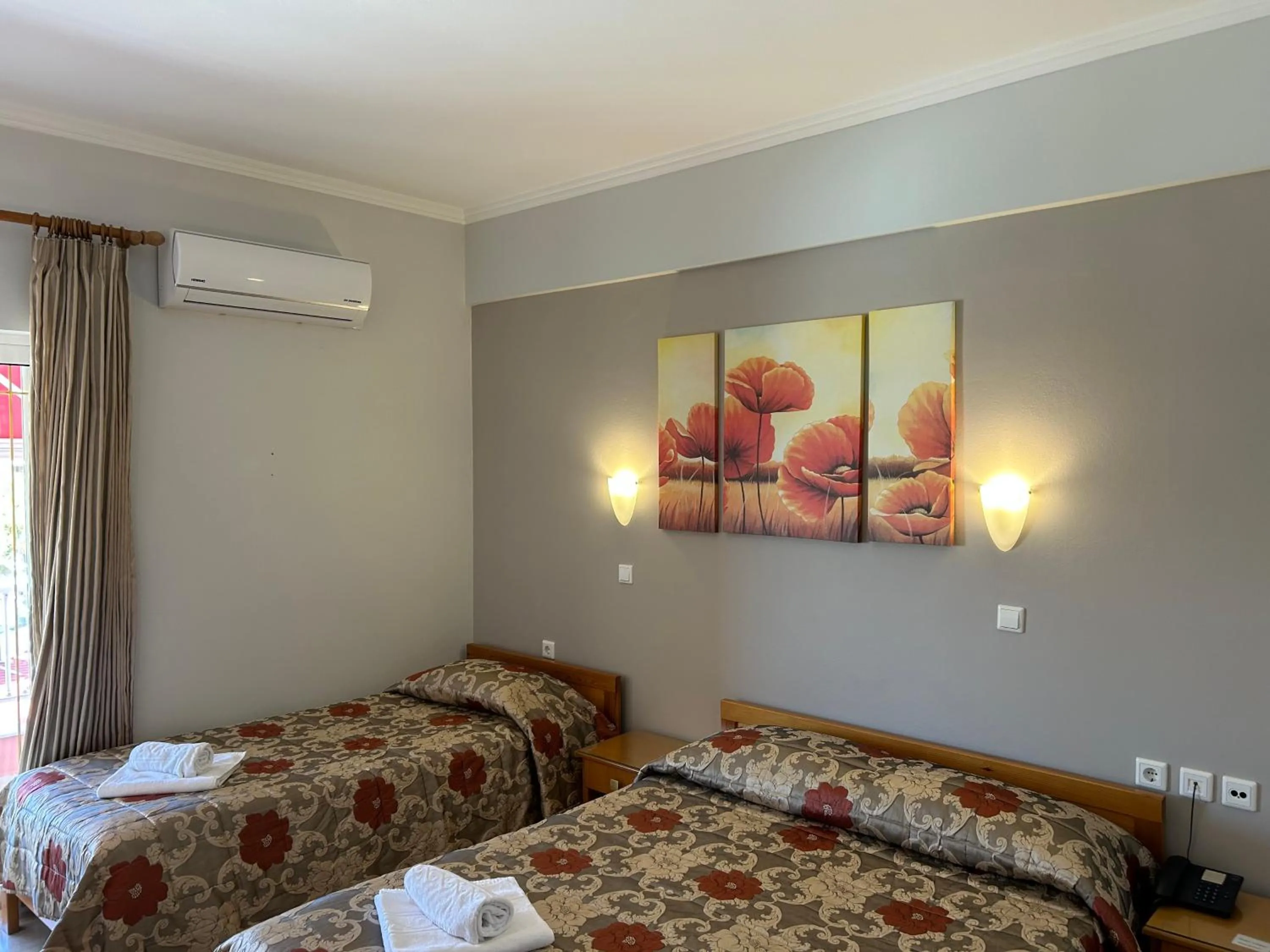 Bed in Brati II Beach Hotel