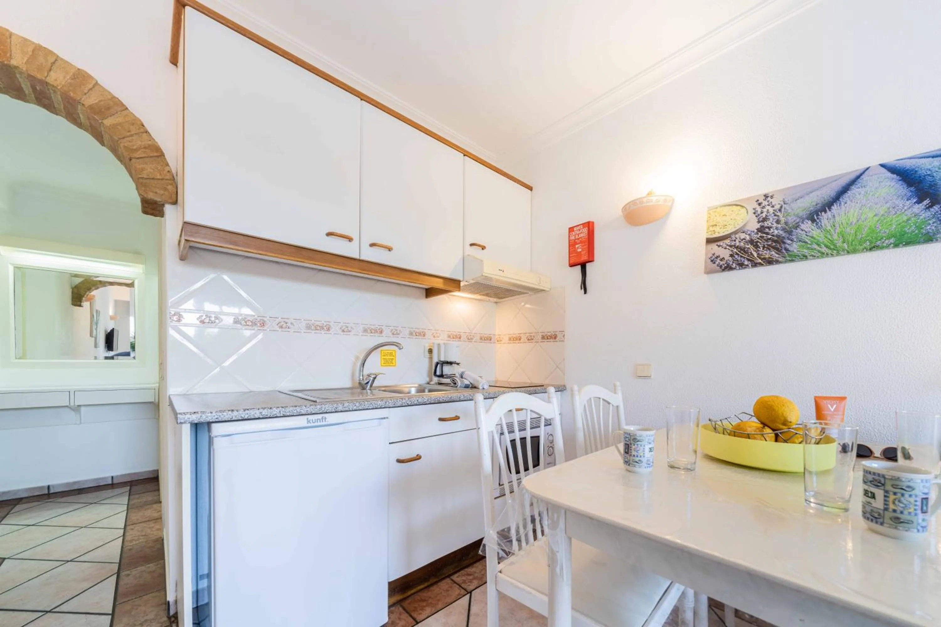 Kitchen or kitchenette in Apartamentos Solar do Sol