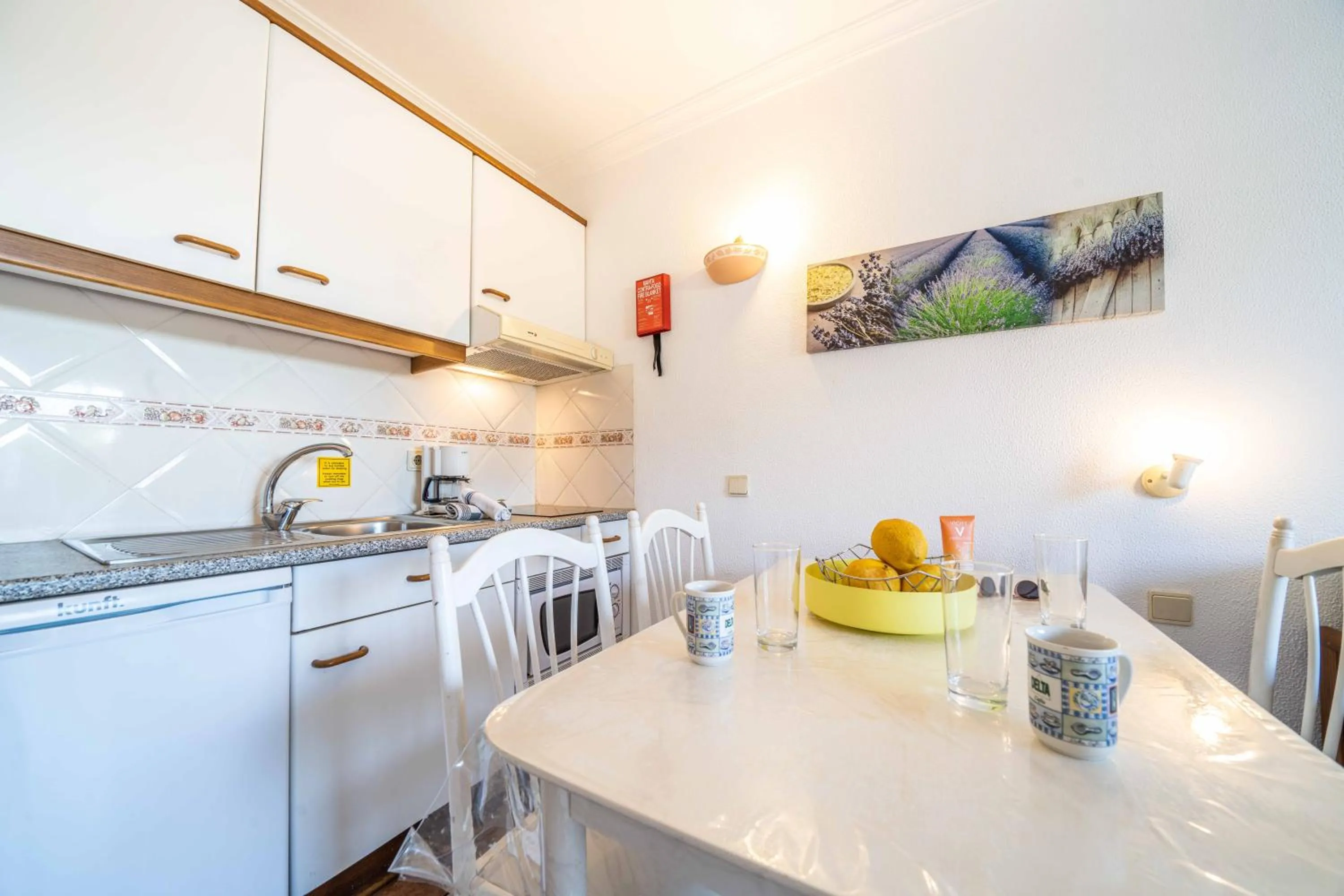 Kitchen or kitchenette in Apartamentos Solar do Sol