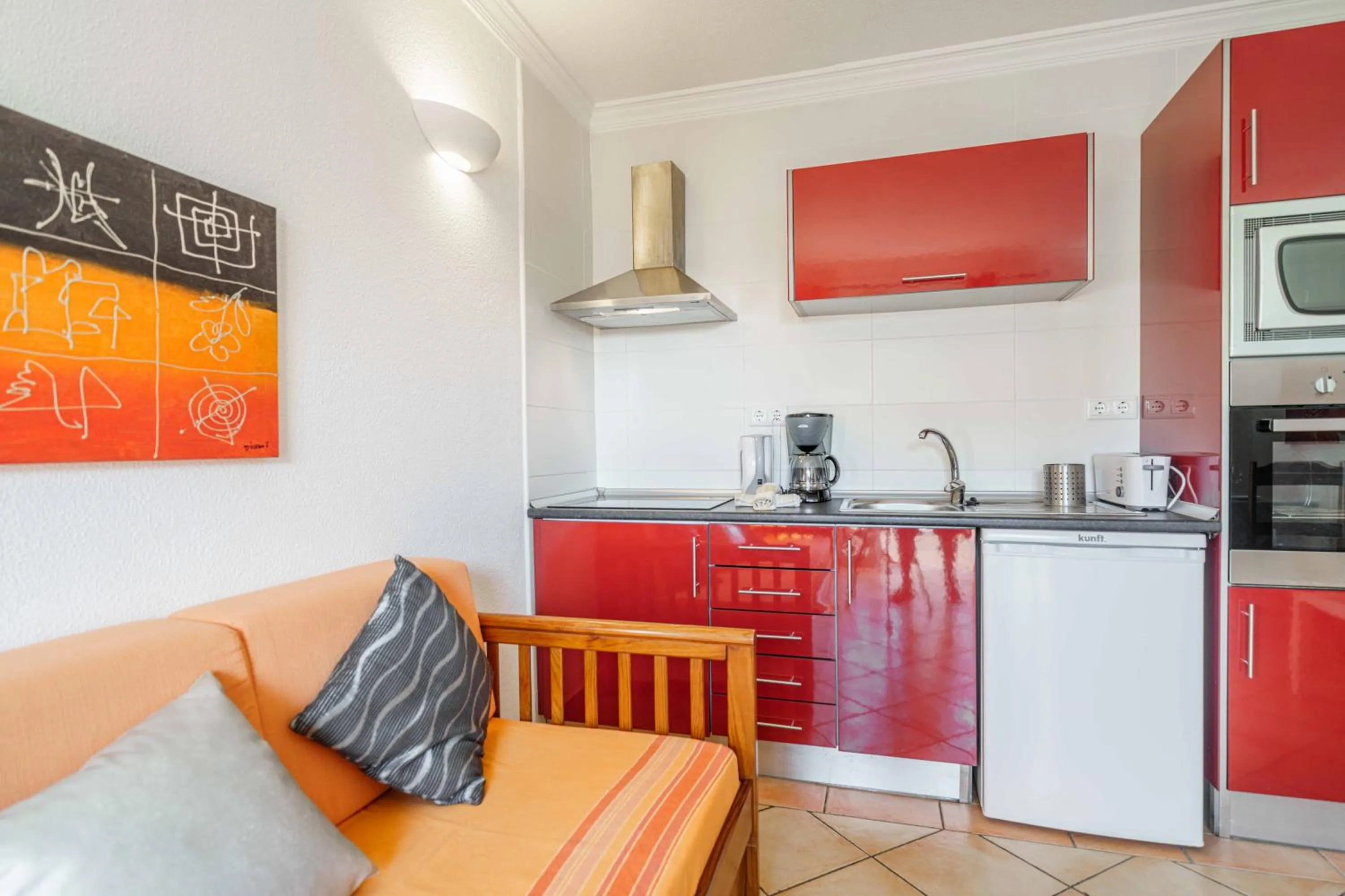 Kitchen or kitchenette in Apartamentos Solar do Sol