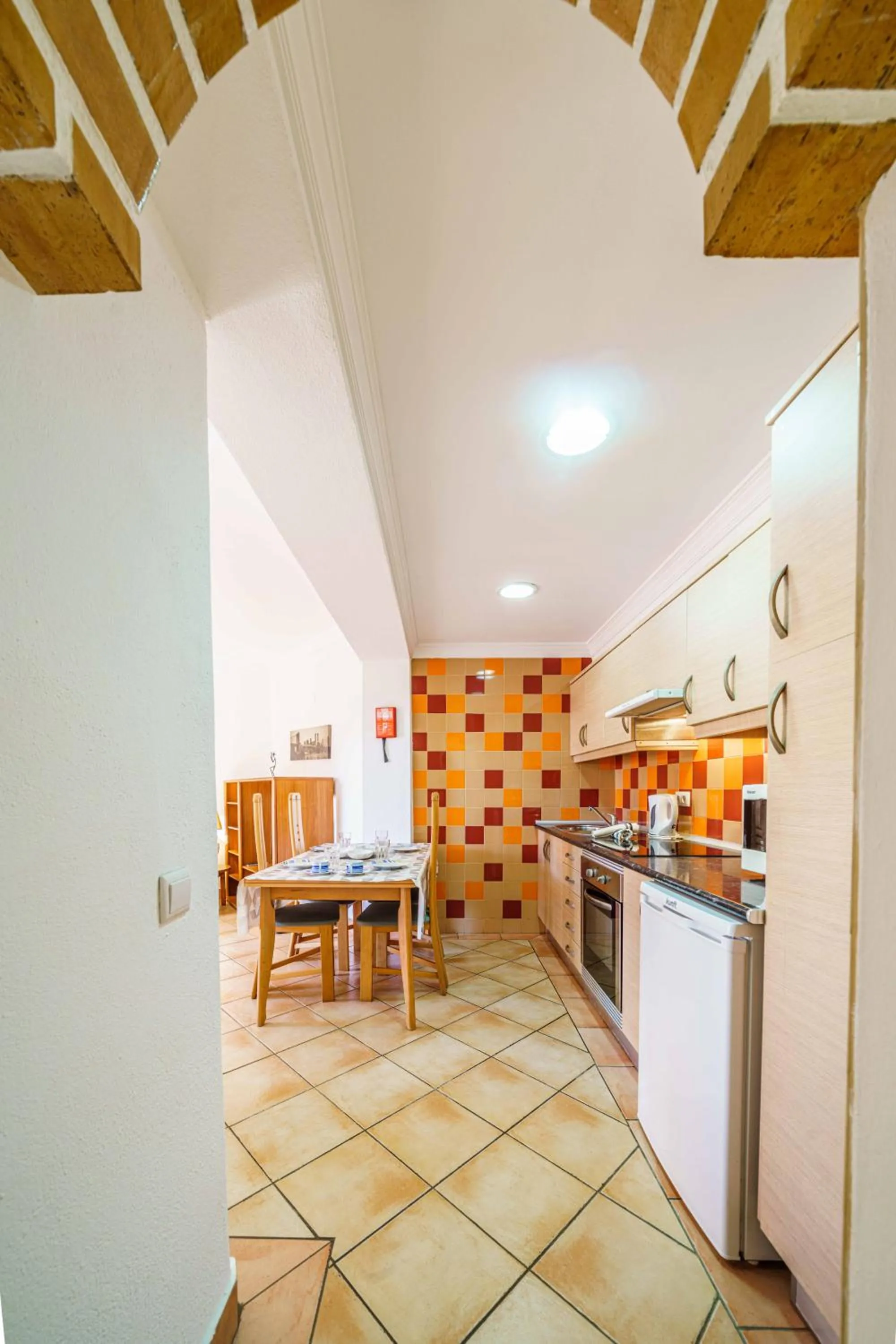 Kitchen or kitchenette in Apartamentos Solar do Sol