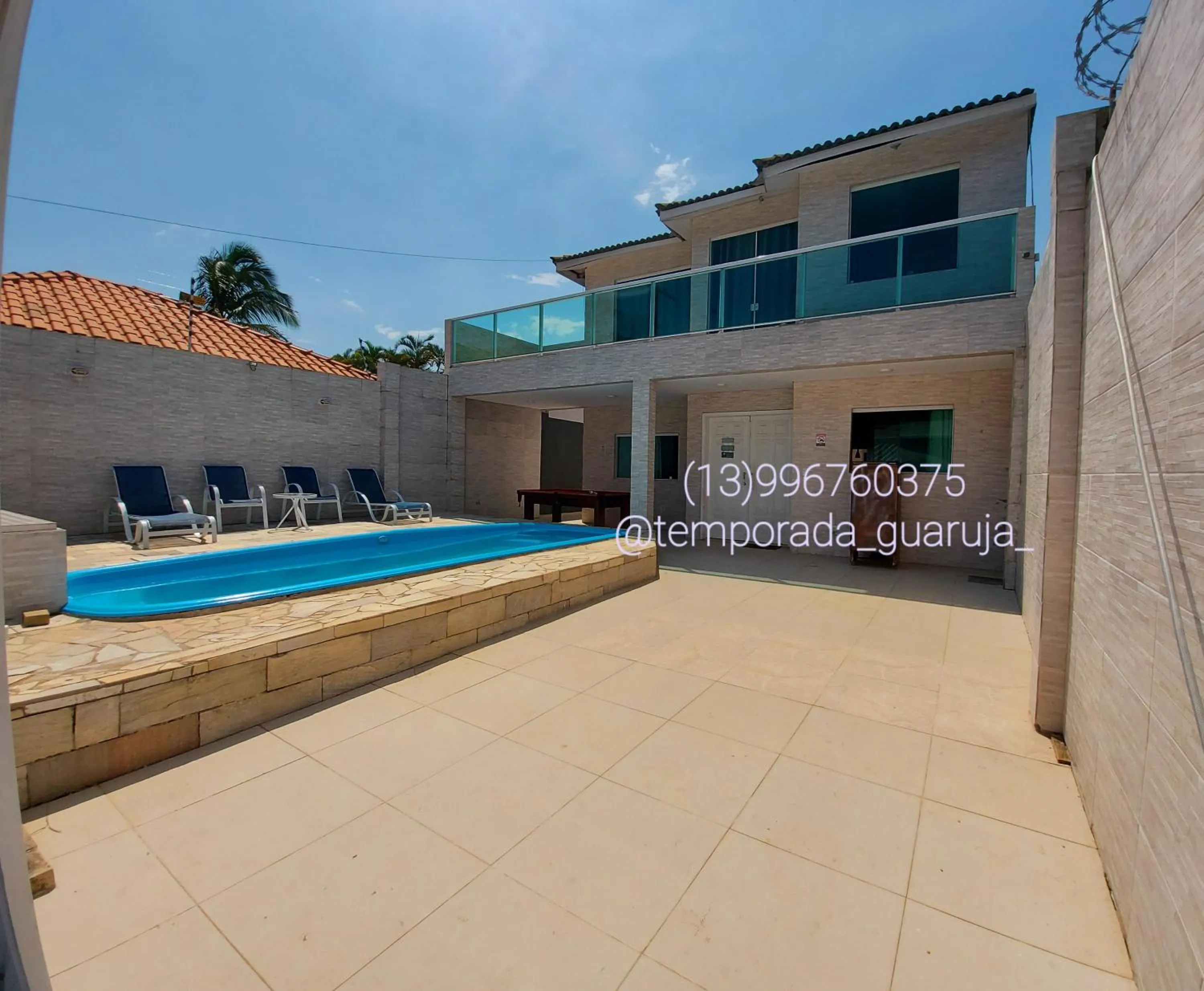 Swimming pool in Casa Praia do Pernambuco Guarujá temporada guaruja