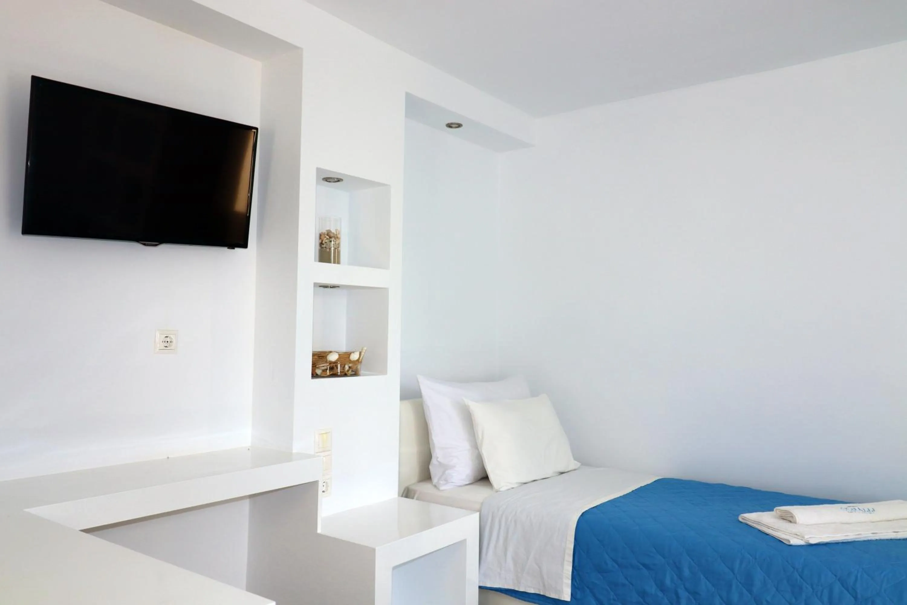 Living room, Bed in Coralli Beach Apartments