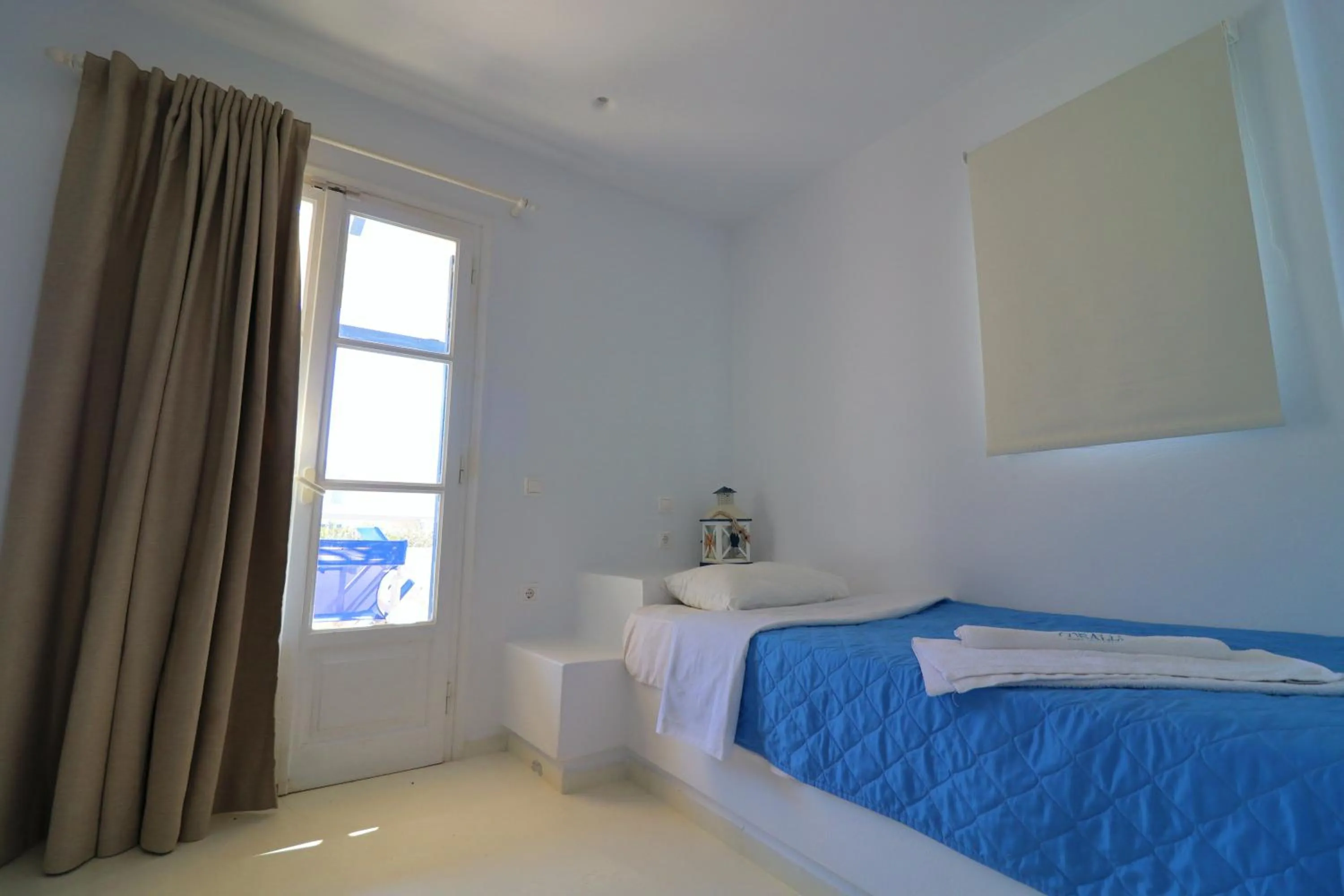 Bed in Coralli Beach Apartments