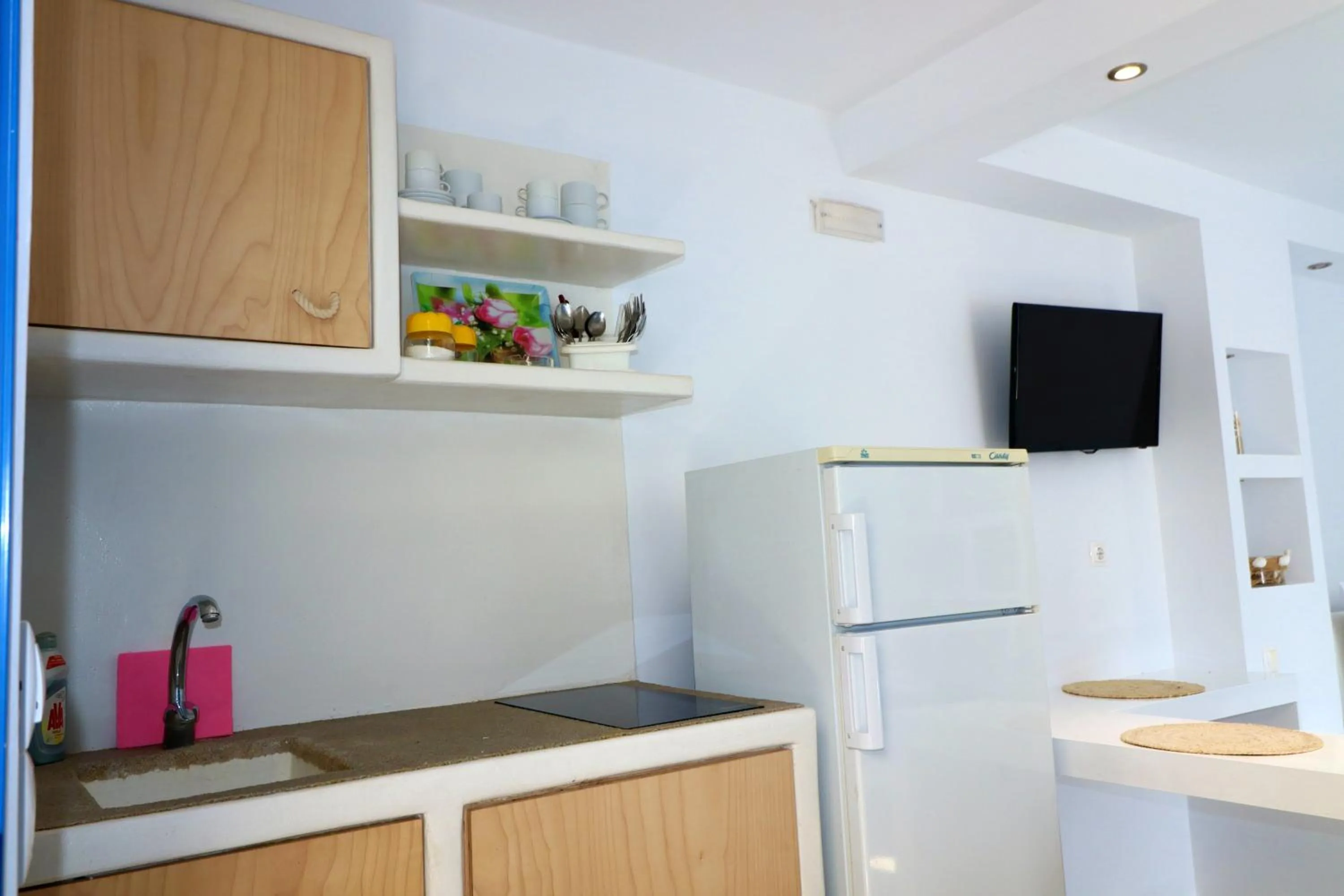 Kitchen or kitchenette in Coralli Beach Apartments