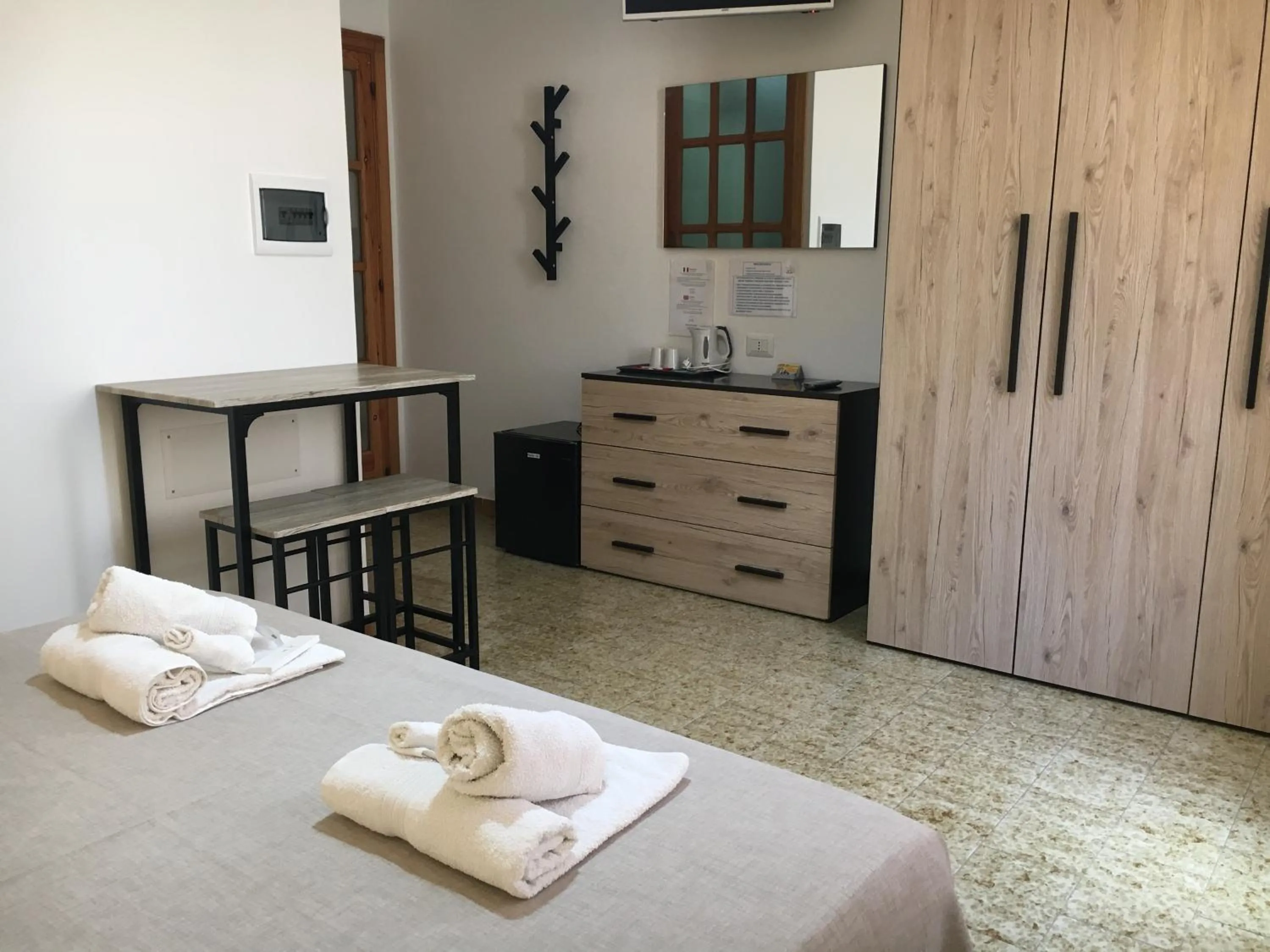 Bed in Mille Soli Bed and Breakfast