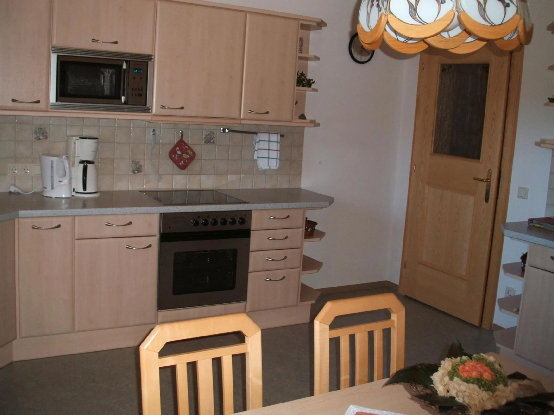 Kitchen or kitchenette in Ferienwohnung Mützengruß