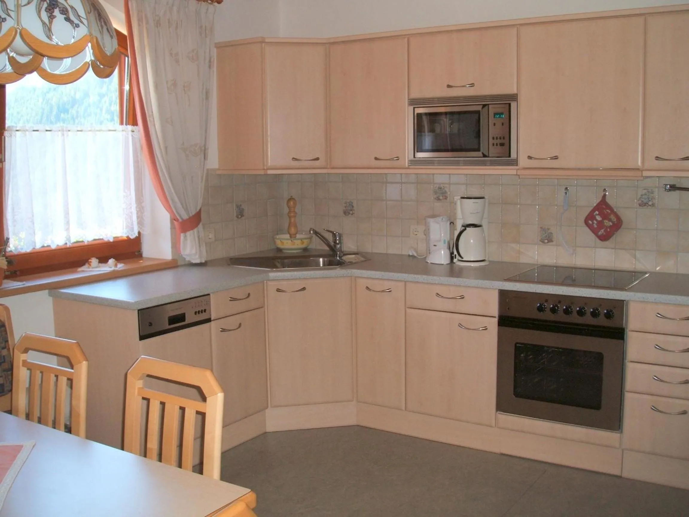 Kitchen or kitchenette in Ferienwohnung Mützengruß