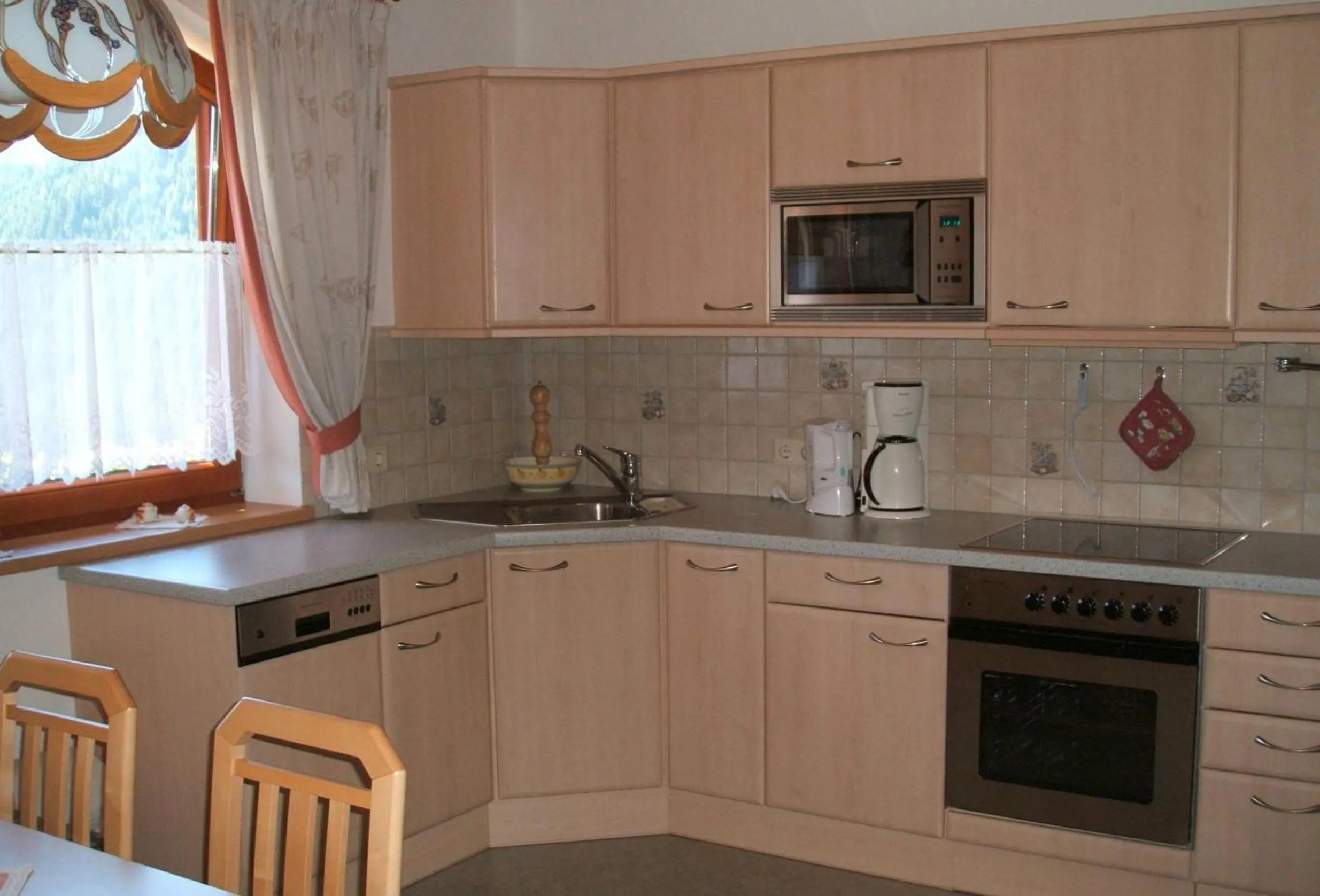Kitchen or kitchenette in Ferienwohnung Mützengruß