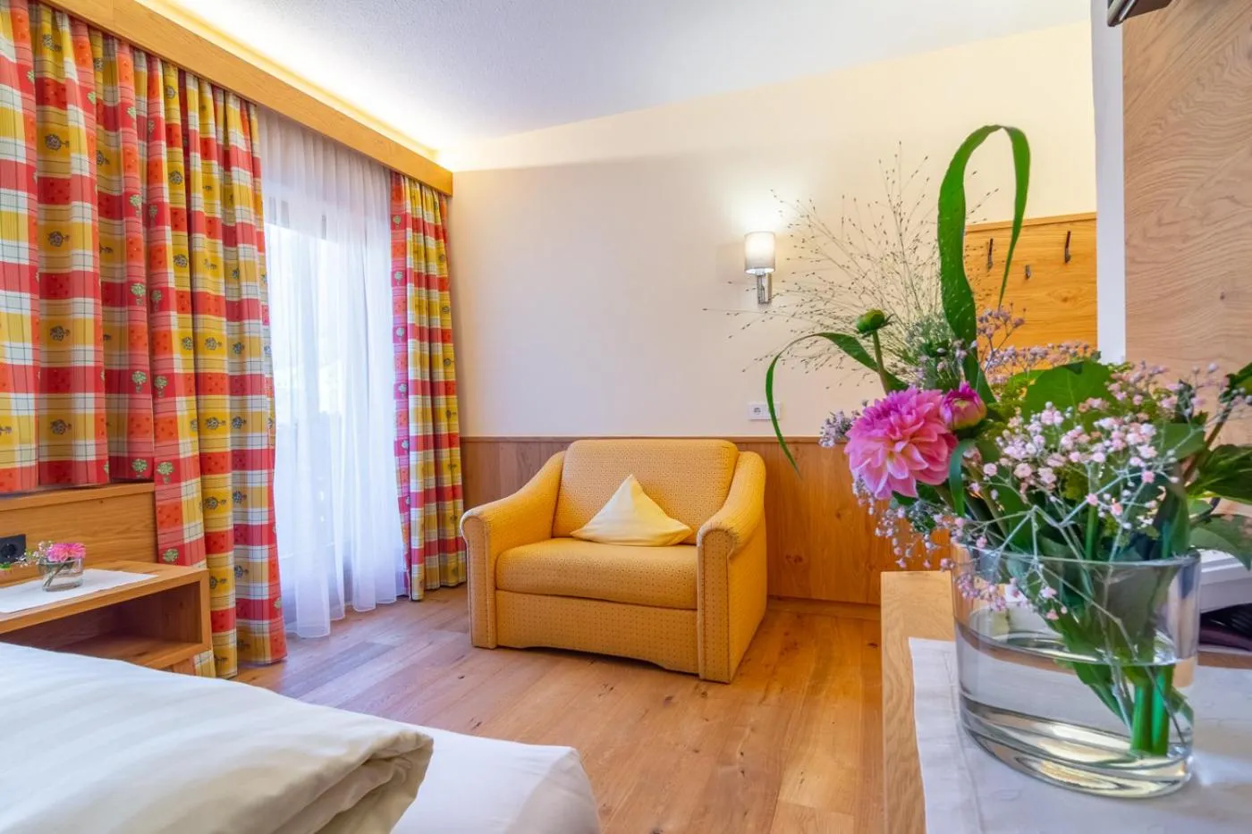 Seating area, Bed in Hotel Sonnhof