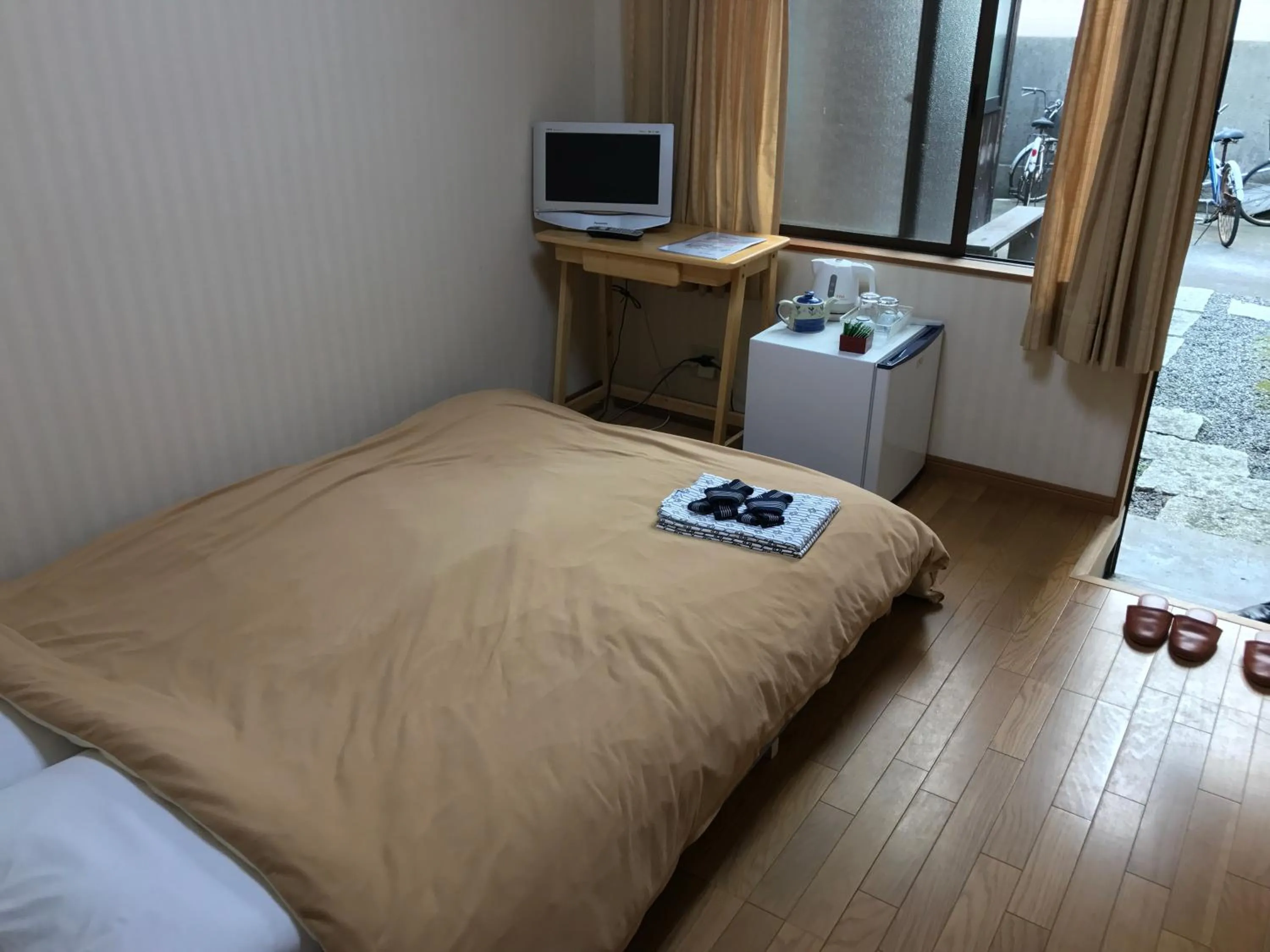 Bed in Minshuku Takenoya