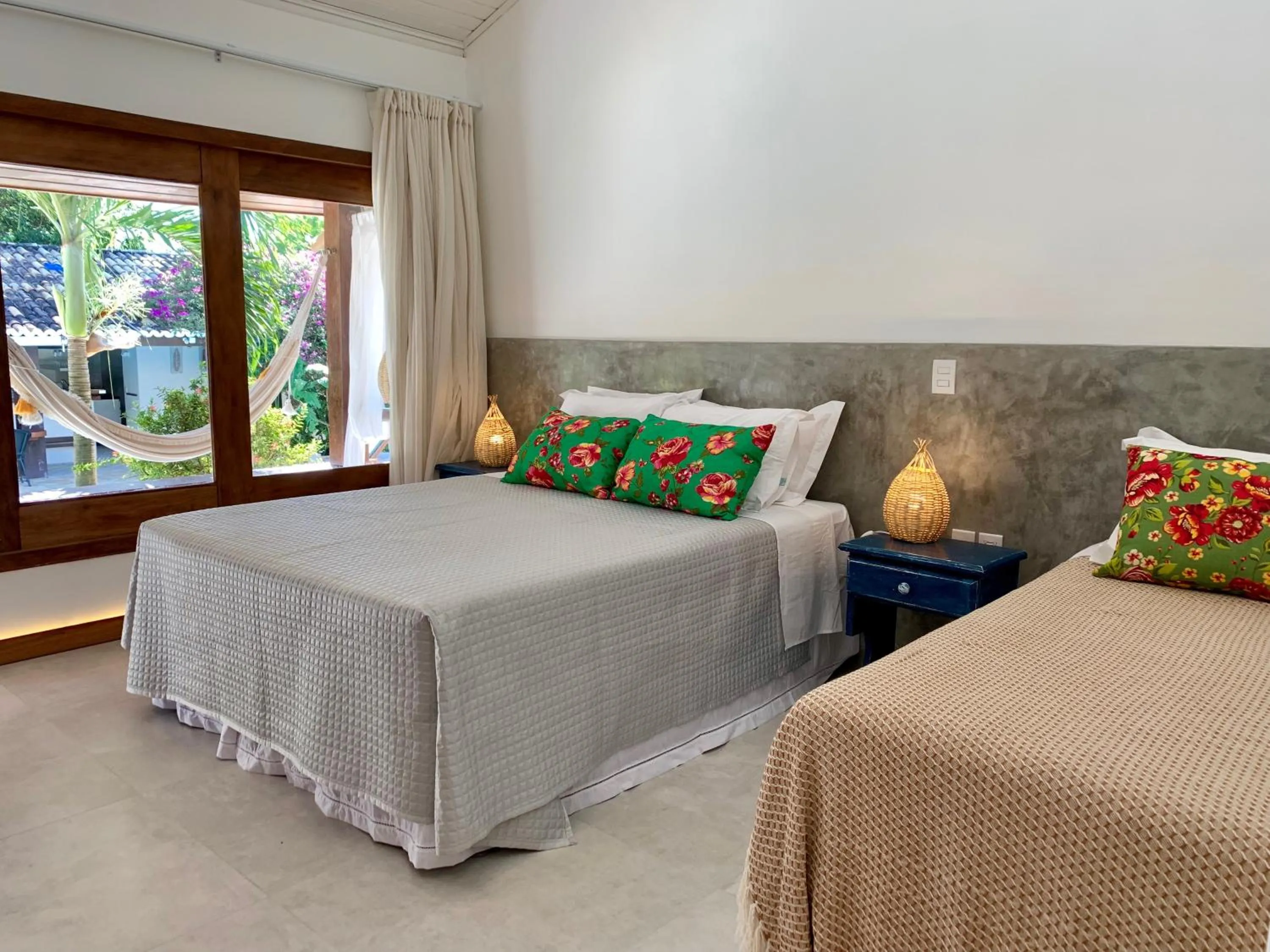 Bed in Pousada Tartaruga Boutique Hotel