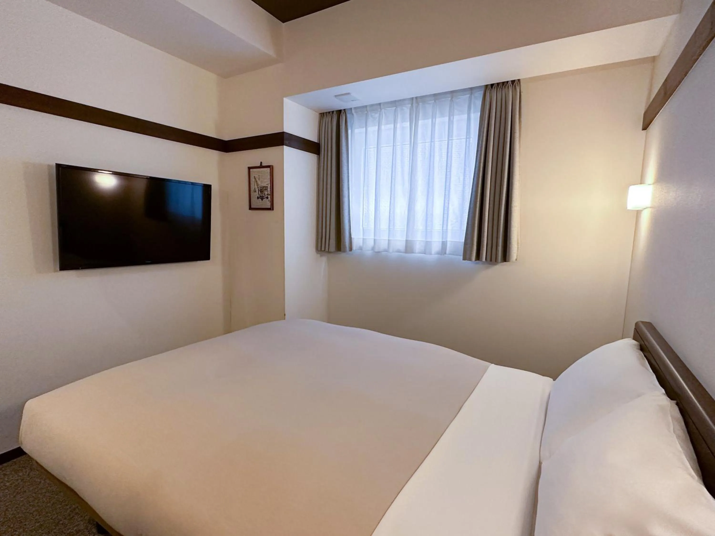 Photo of the whole room, Bed in The OneFive Tokyo Shibuya