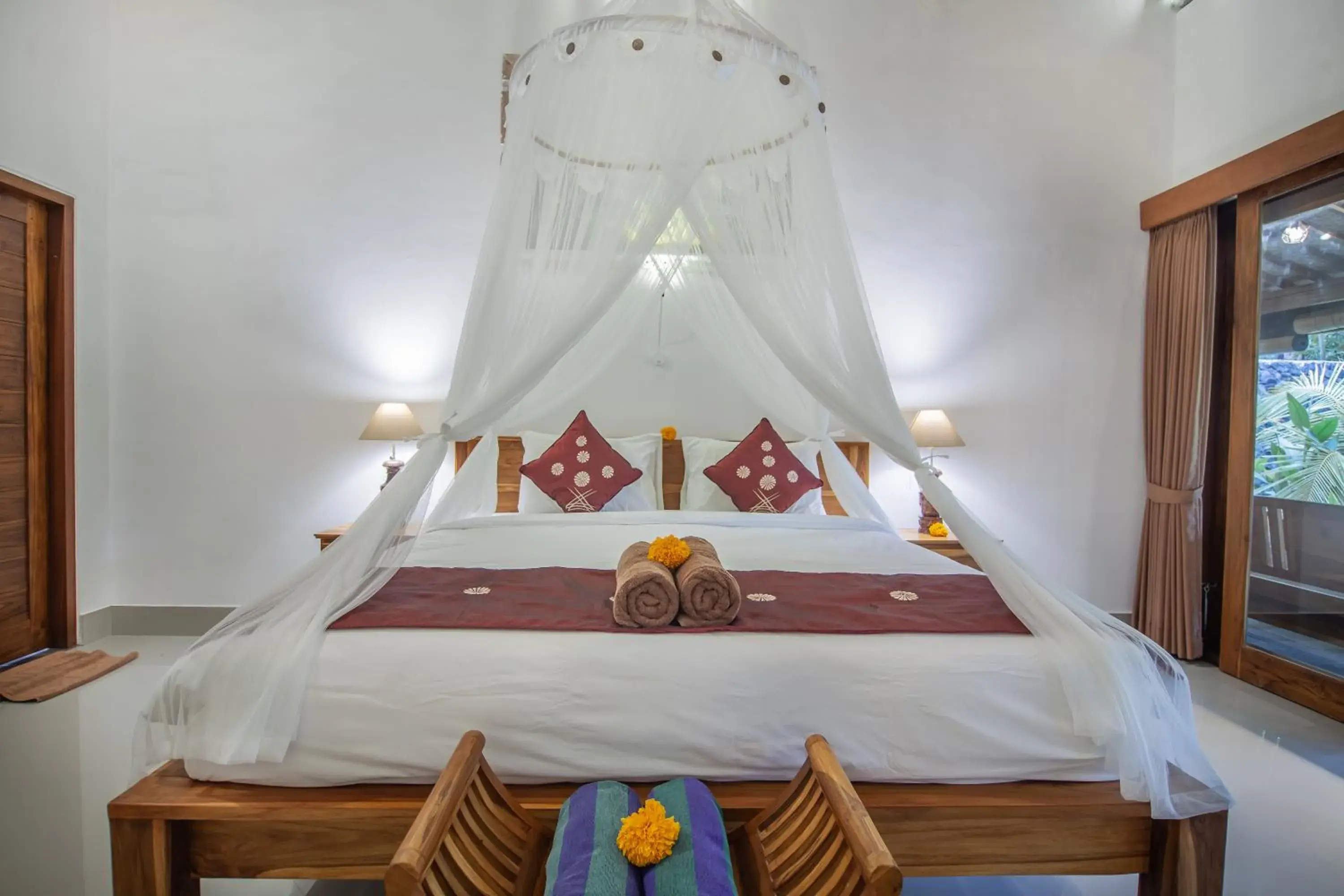 Bed in Jero Sebali Villa by Travellink Bali Bed in Jero Sebali Villa by Travellink Bali