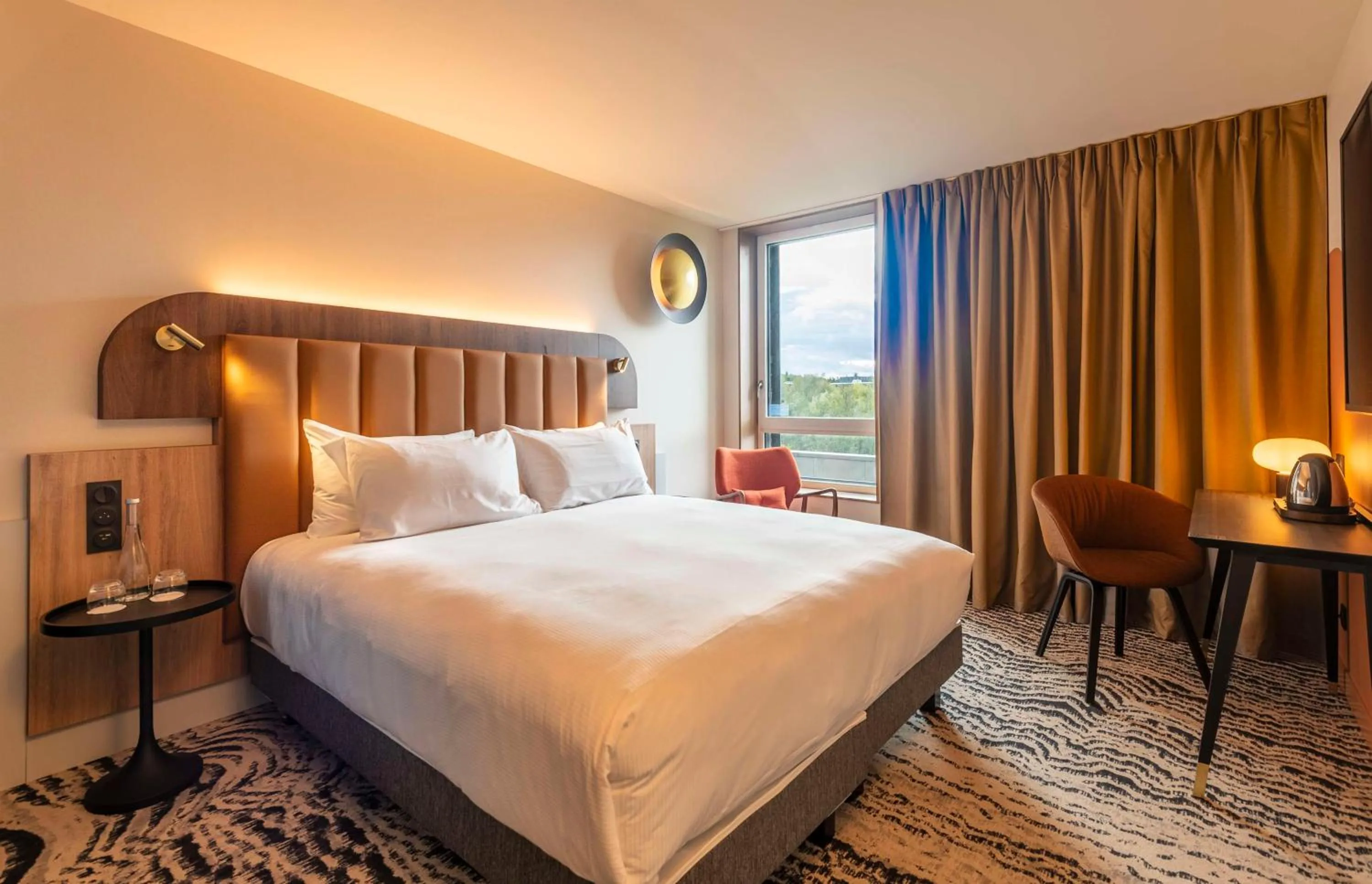 Bed in DoubleTree by Hilton Lyon Eurexpo