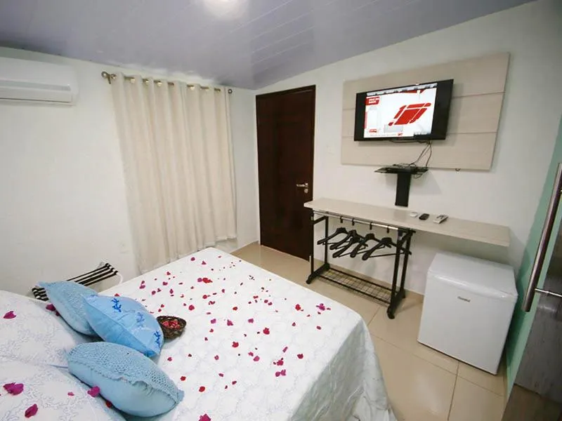 Bed in Pousada Del Mares