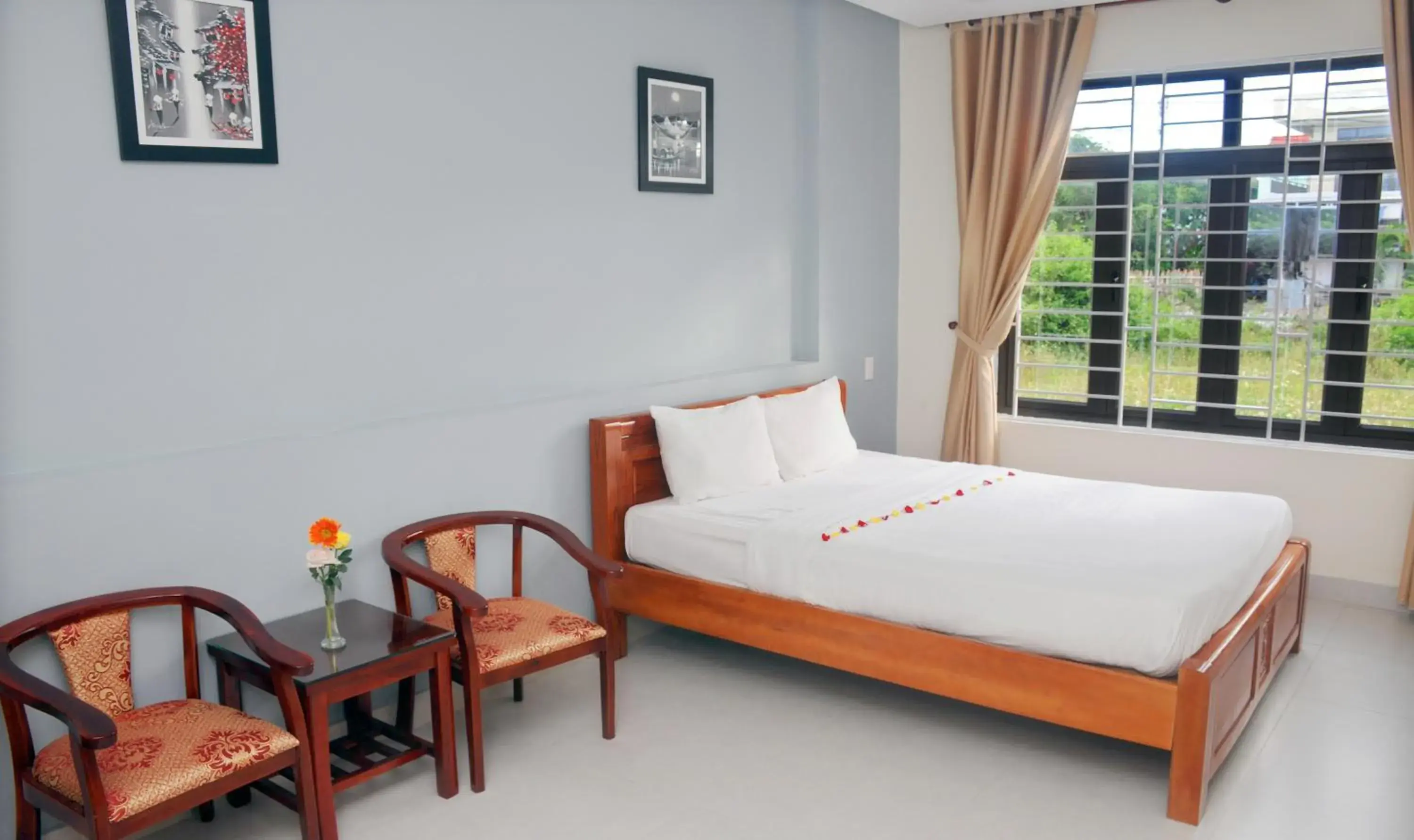 Garden view, Bed in Melody Boutique Villa Hoi An Garden view, Bed in Melody Boutique Villa Hoi An